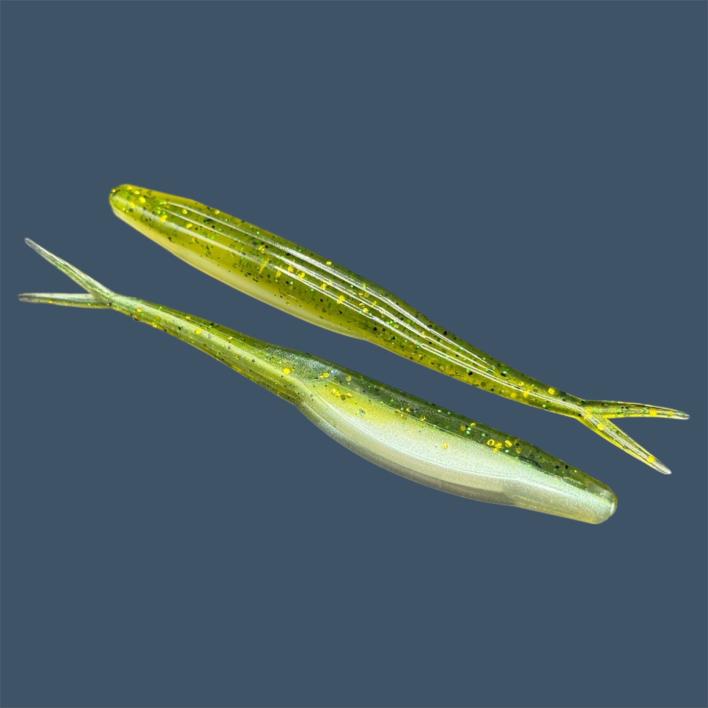 Split Tail Shad soft plastic Fluke style bait with realistic shad appearance, featuring a slotted belly for weedless rigging. Jerkbait in Baby Bass a proven fish-catching color