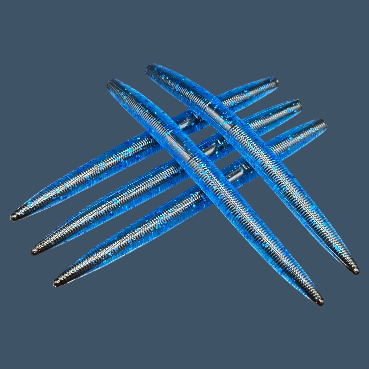 Black n' Blue Corked Boomstick, core shot stick baits in bold colorways of Blue and Black, soft plastic lures bass fishing from Big League Bait Company.