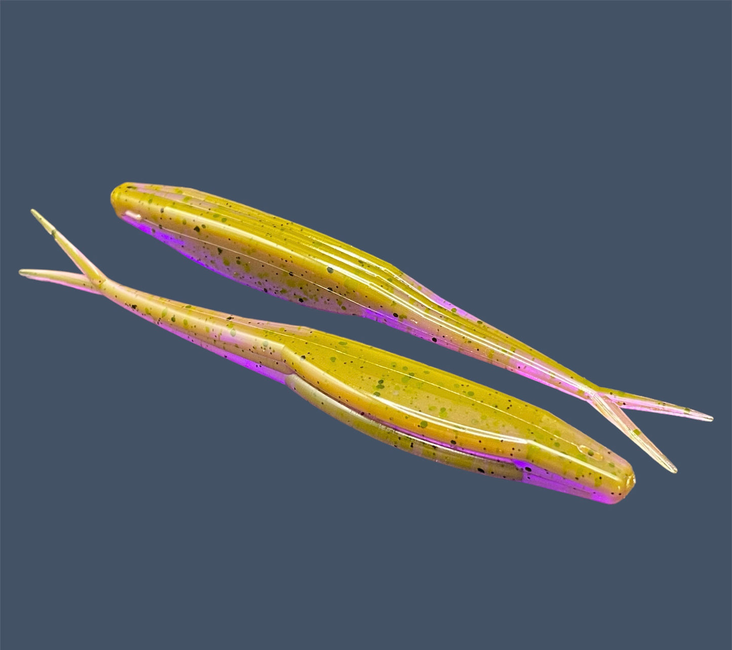 Split Tail Shad soft plastic Fluke style bait with realistic shad appearance, featuring a slotted belly for weedless rigging. Jerkbait in Chameleon a proven fish-catching color