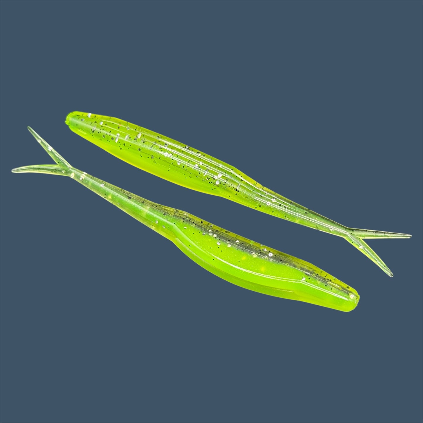 Split Tail Shad soft plastic Fluke style bait with realistic shad appearance, featuring a slotted belly for weedless rigging. Jerkbait in Chartreuse Shad a proven fish-catching color