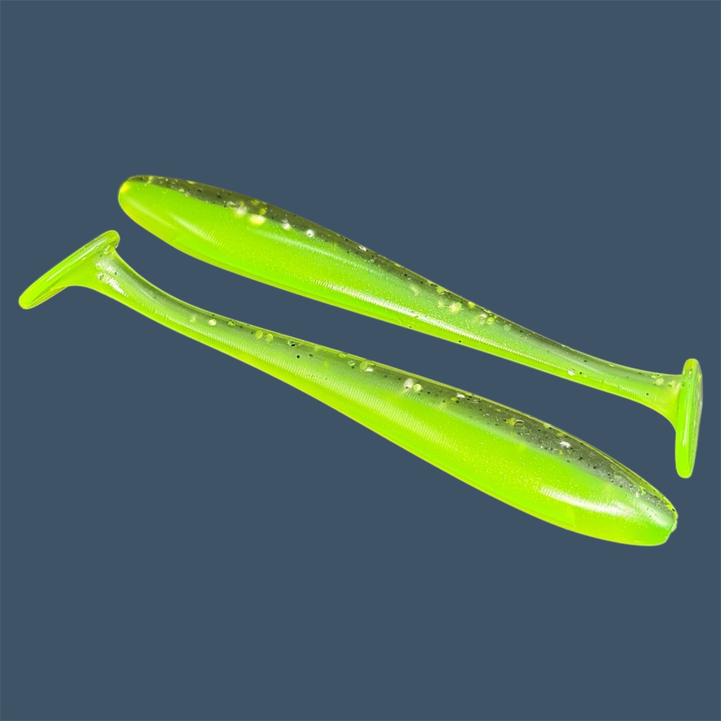 Pro Swim 4-inch paddle tail soft plastic swimbait with realistic shad shape and hook slot, shown in Chartreuse Shad a proven fish-catching color