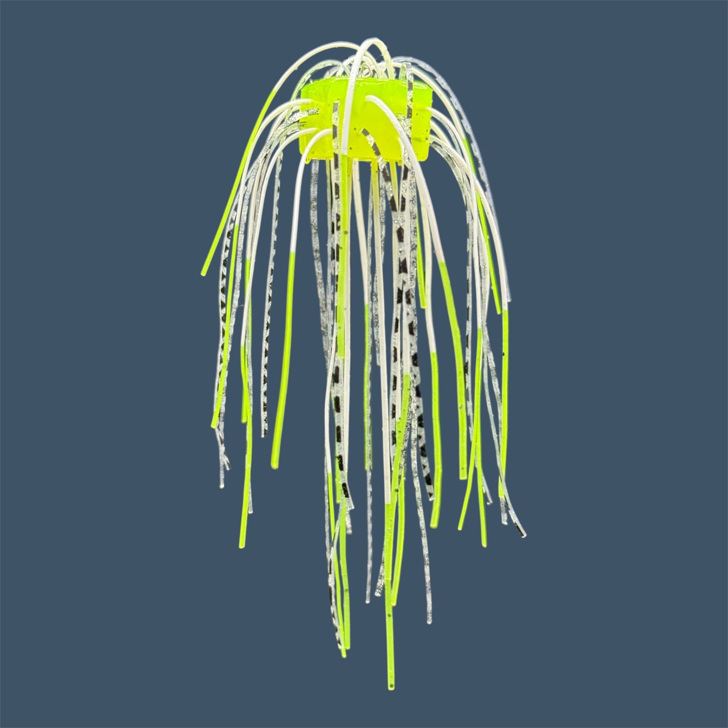 Skirted Cube Fuzzy Dice-style soft plastic bass lure, threaded with lifelike skirt material, perfect for drop shot and wacky rig finesse fishing.Shown in Chartreuse Shad