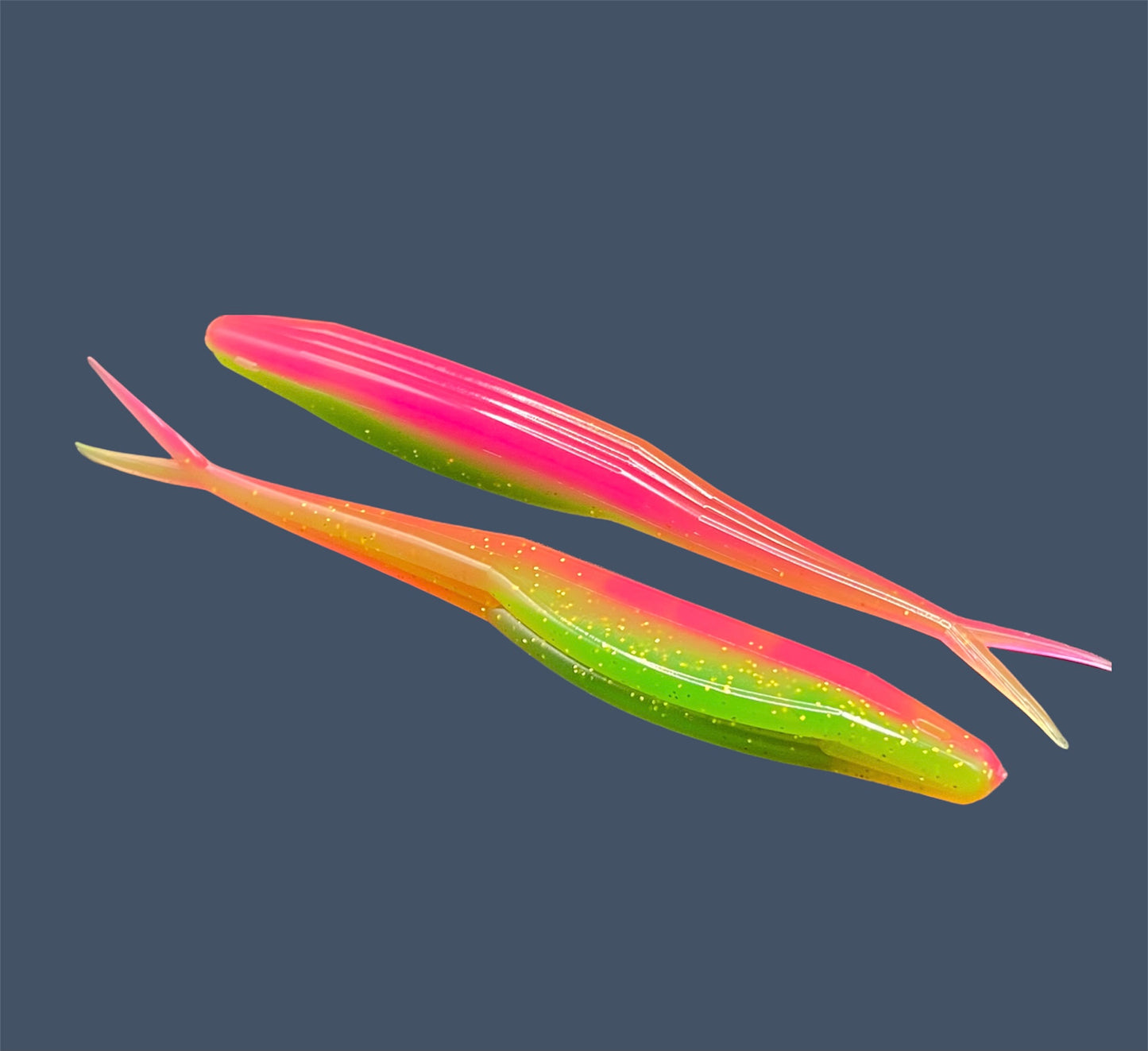 Split Tail Shad soft plastic Fluke style bait with realistic shad appearance, featuring a slotted belly for weedless rigging. Jerkbait in Electric Chicken (Pink over Green) a proven fish-catching color