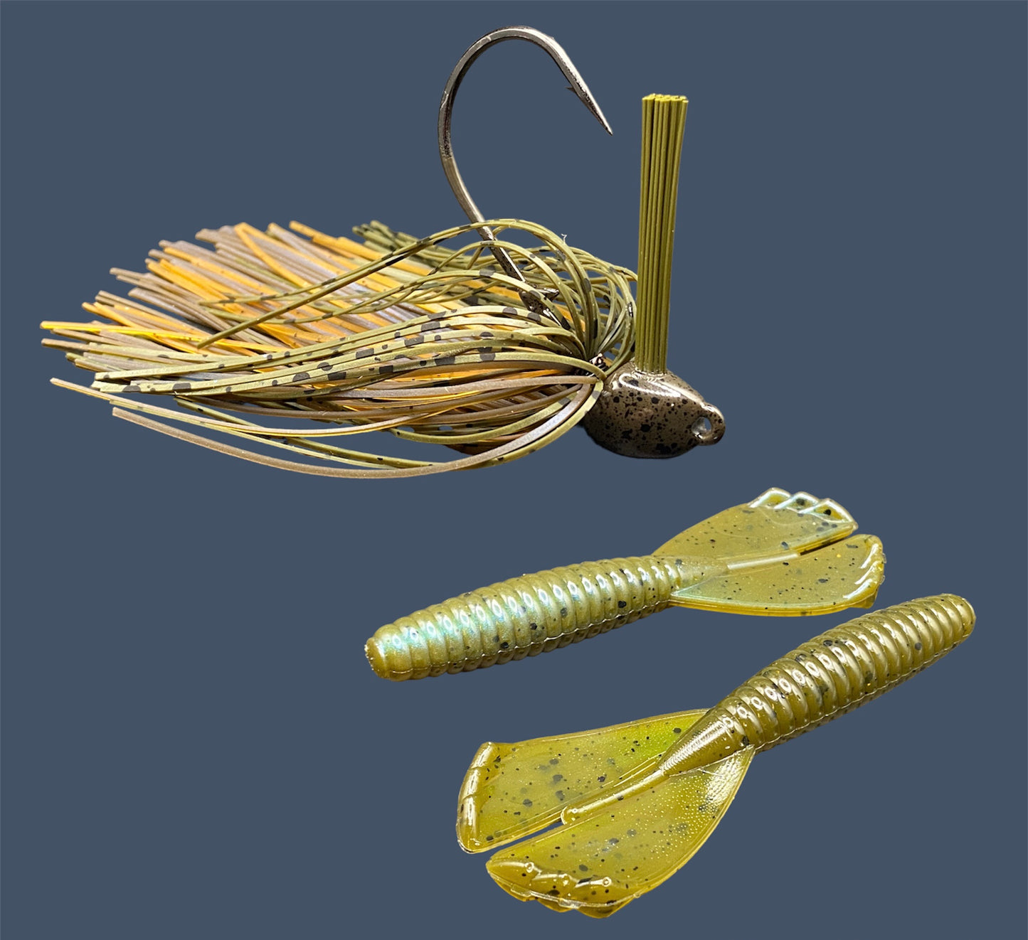 Fishing lure bundle with a high-quality jig and soft plastic bait, perfect for bass fishing with a variety of soft plastic lures. Shown here in color Magic Craw (Green Pumpkin and Blue) is a hand tied green pumpkin flipping jig paired with Big League Bait Grub 3.5"