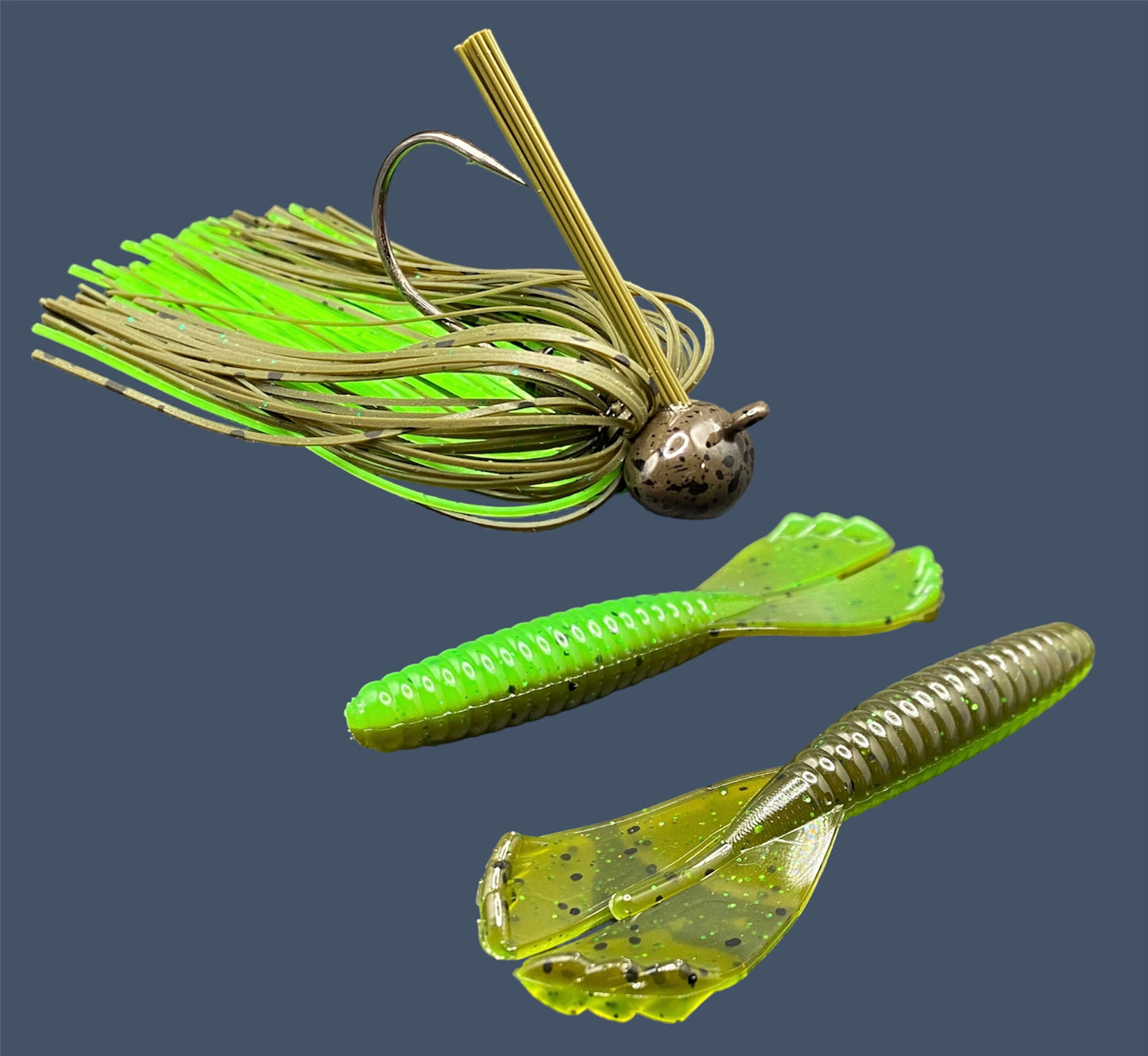 Fishing lure bundle with a high-quality jig and soft plastic bait, perfect for bass fishing with a variety of soft plastic lures. Shown here in color Envy (Green Pumpkin over Green) is a hand tied green pumpkin football jig paired with Big League Bait Grub 3.5"