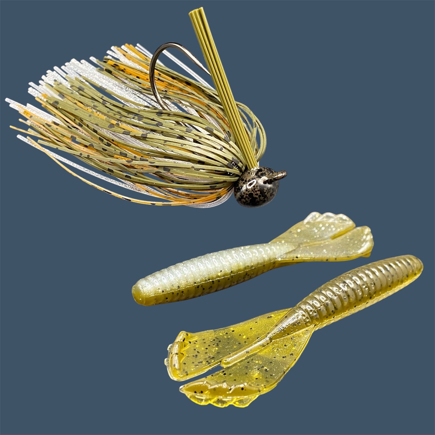 Fishing lure bundle with a high-quality jig and soft plastic bait, perfect for bass fishing with a variety of soft plastic lures. Shown here in color GP Flash (Green Pumpkin and Silver) is a hand tied green pumpkin football jig paired with Big League Bait Grub 3.5"