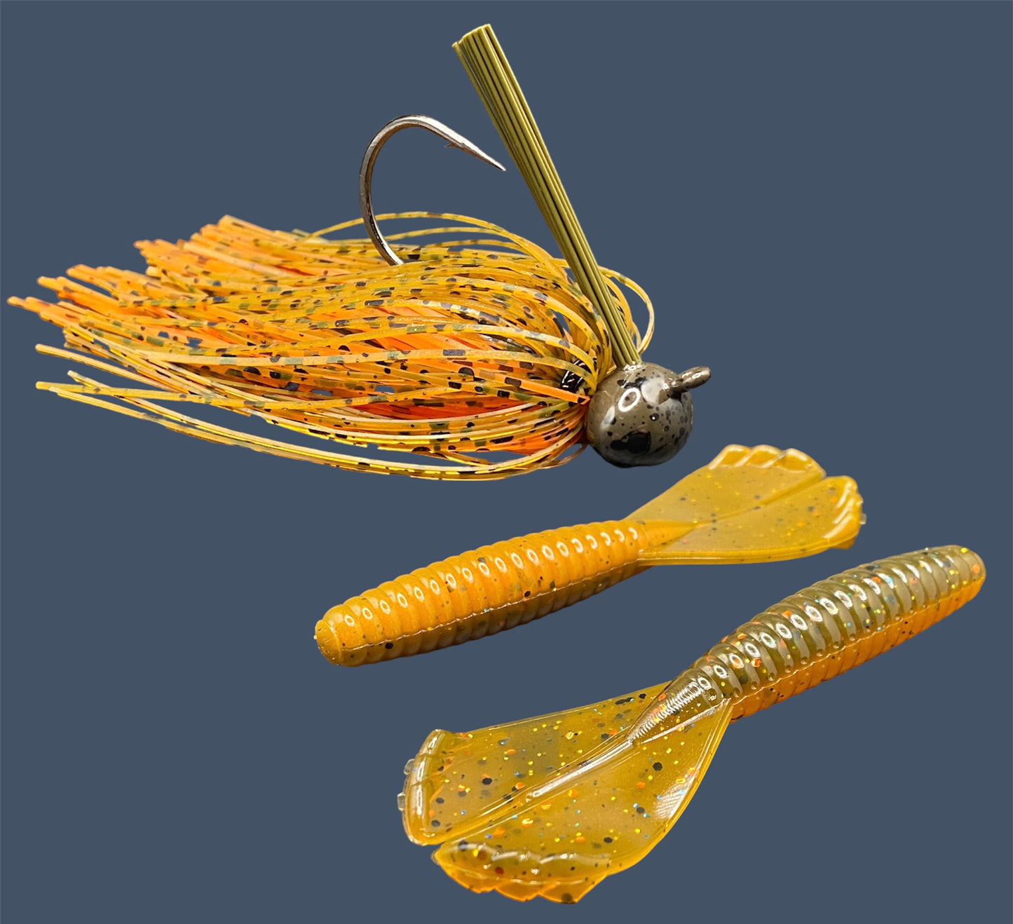 Fishing lure bundle with a high-quality jig and soft plastic bait, perfect for bass fishing with a variety of soft plastic lures. Shown here in color Pumpkin Spice (Green Pumpkin over Orange) is a hand tied green pumpkin football jig paired with Big League Bait Grub 3.5"