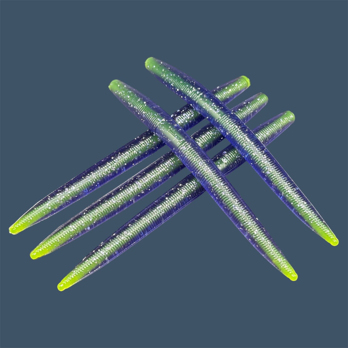 Galazy Corked Boomstick, core shot stick baits in bold colorways of purple and yellow, soft plastic lures bass fishing from Big League Bait Company.