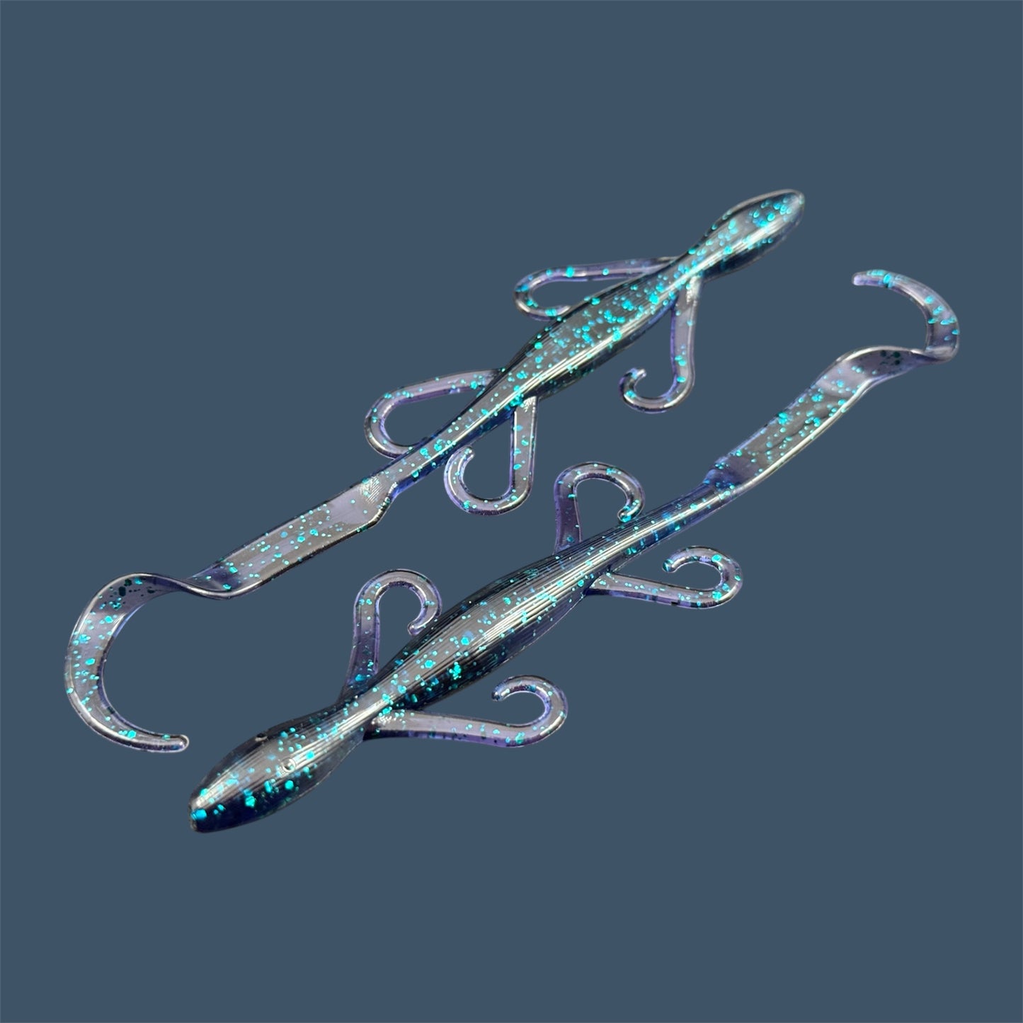 Lizard creature bait with sleek body, free-flowing appendages, and curl tail, ideal for Texas and Carolina rigs, shown in Junebug a proven fish-catching color