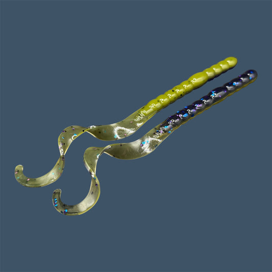 Soft plastic curly/ribbon tail worm 7.5-inch with realistic movement and versatile design for Texas and Carolina rigs. 7.5" Curl Tail Worm shown in Luau. (Purple over Banana Seed)