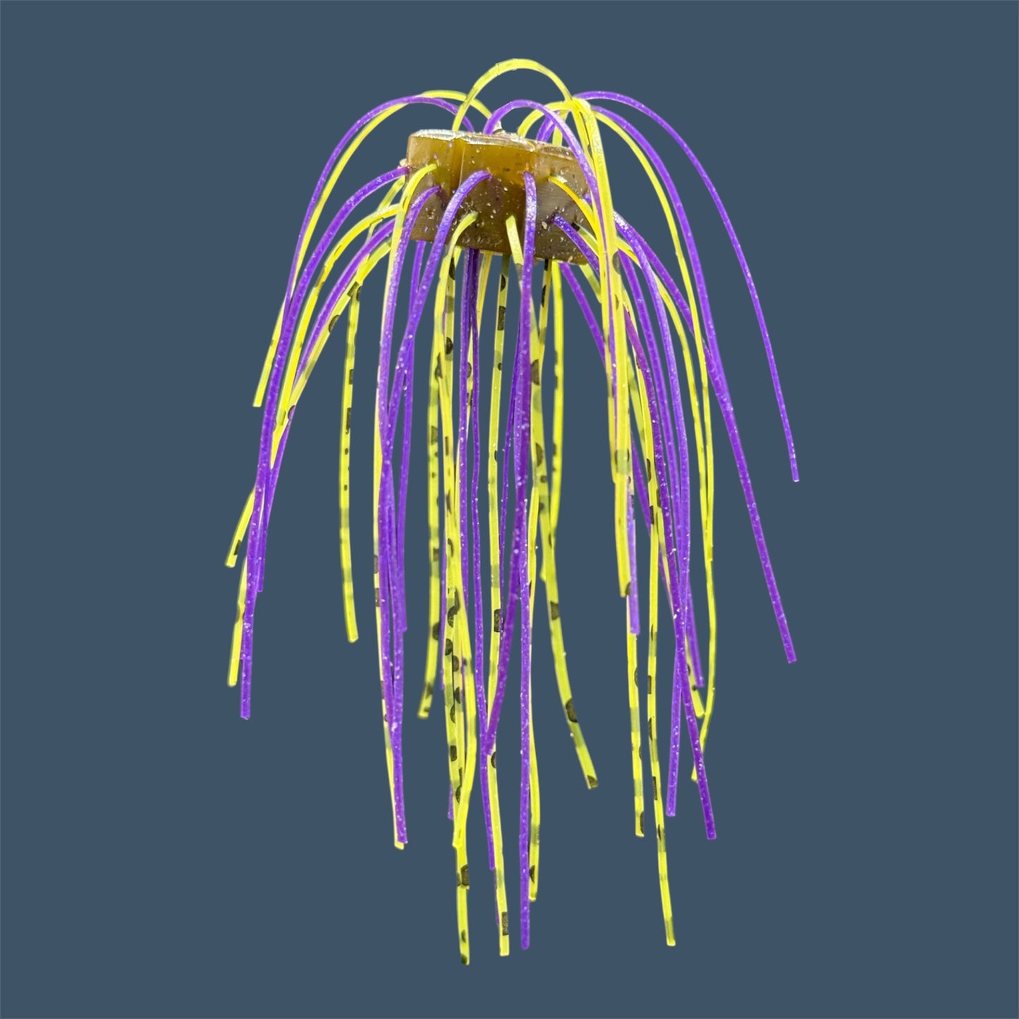 Skirted Cube Fuzzy Dice-style soft plastic bass lure, threaded with lifelike skirt material, perfect for drop shot and wacky rig finesse fishing. Shown in Luau