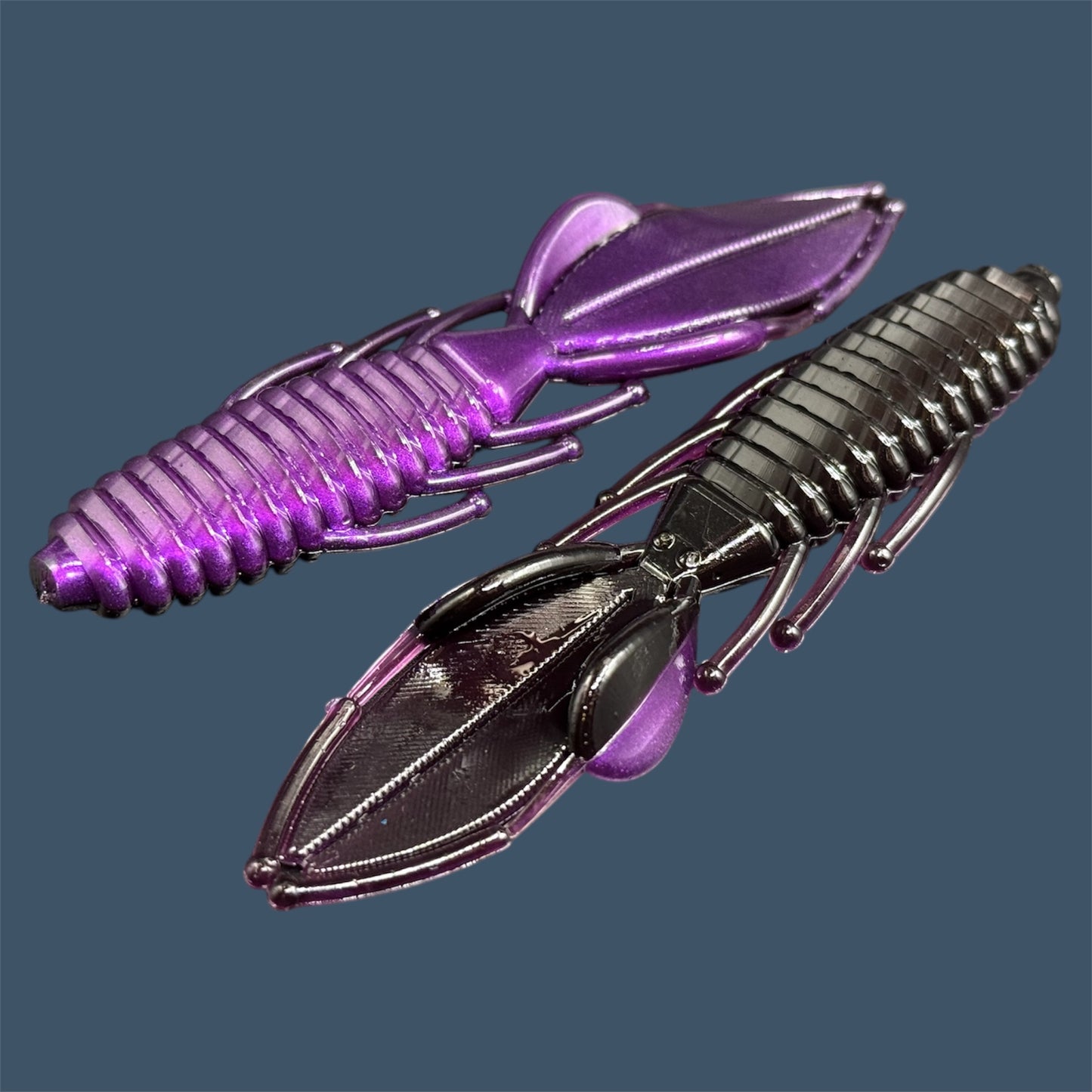 Bed Wrecker soft plastic bait with dynamic beaver-style tail, featuring a peel-apart tail and versatile appendages, Beaver style baits available in Midnight Purple (Black and Purple)