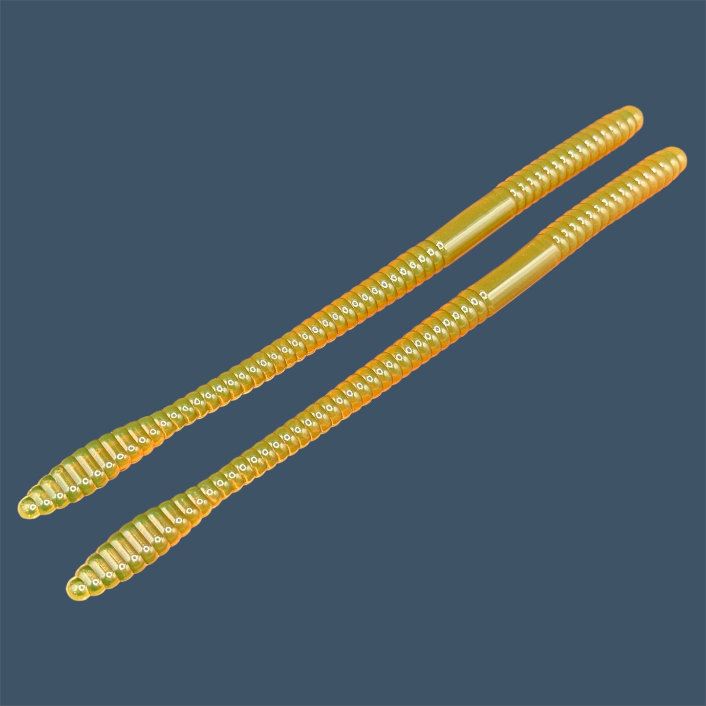 Soft Plastic Trick worm/Straight Tail Worm with flat spade-shaped tail and slender ribbed body. Spade Tail Worm in the color Motor Oil a proven fish-catching color