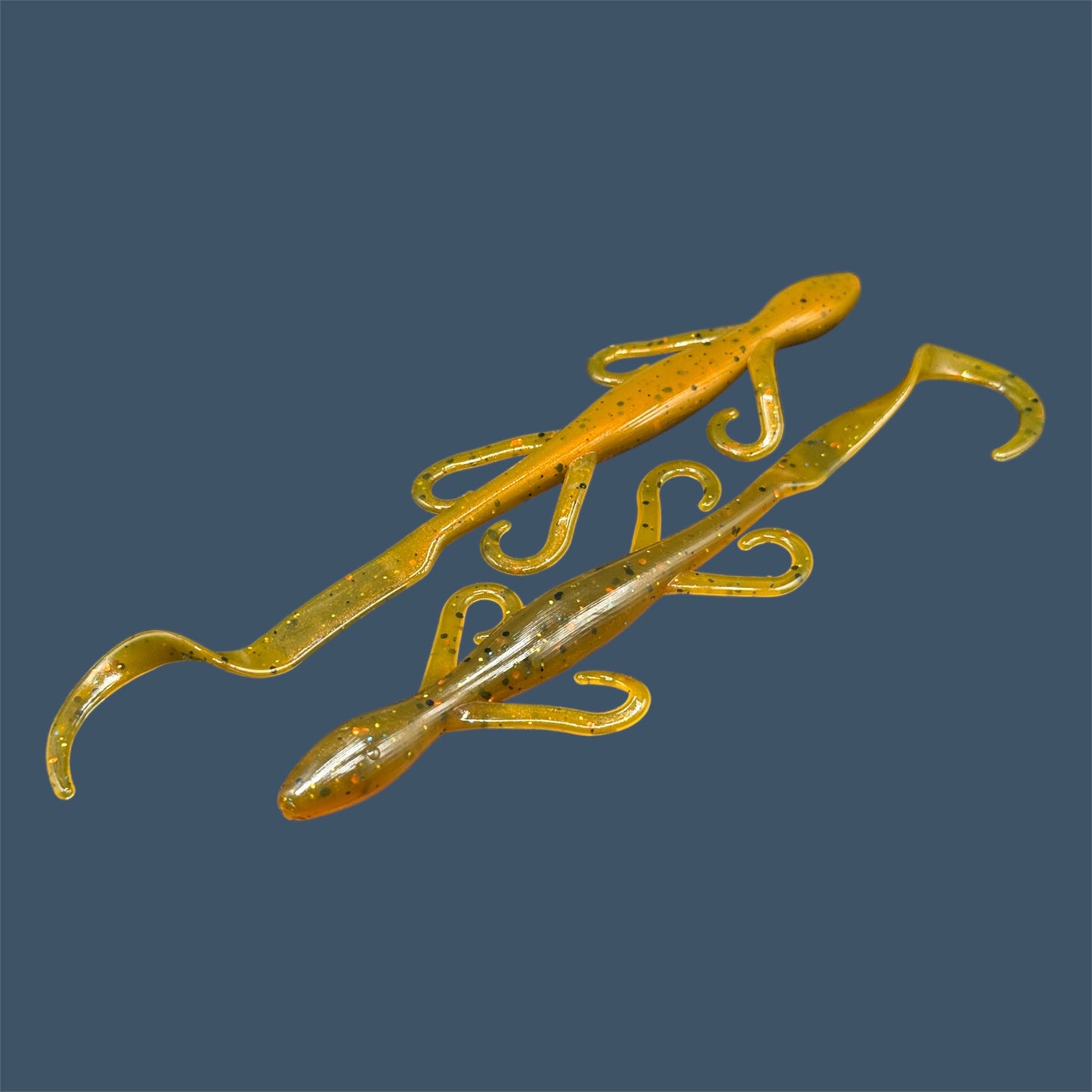 Lizard creature bait with sleek body, free-flowing appendages, and curl tail, ideal for Texas and Carolina rigs, shown in Pumpkin Spice a proven fish-catching color