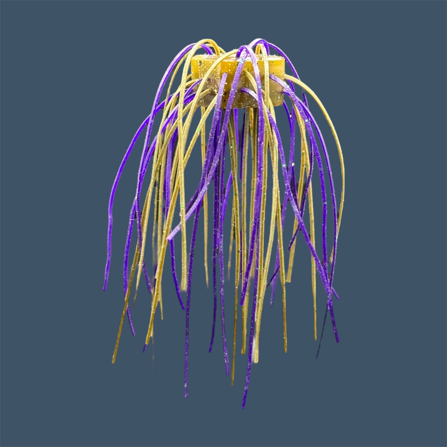 Skirted Cube Fuzzy Dice-style soft plastic bass lure, threaded with lifelike skirt material, perfect for drop shot and wacky rig finesse fishing.Shown in Swamp Juice