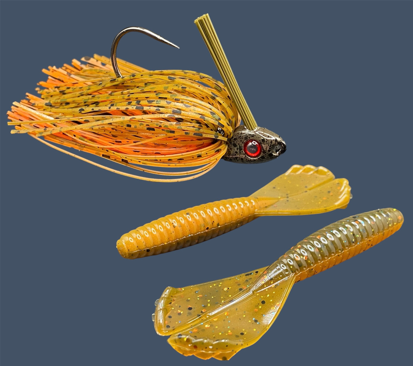 Fishing lure bundle with a high-quality jig and soft plastic bait, perfect for freshwater and saltwater fishing with a variety of soft plastic lures. Shown here in color Pumpkin Spice (Green Pumpkin over Orange) is a hand tied Green Pumpkin swim jig paired with Big League Bait Grub 3.5"
