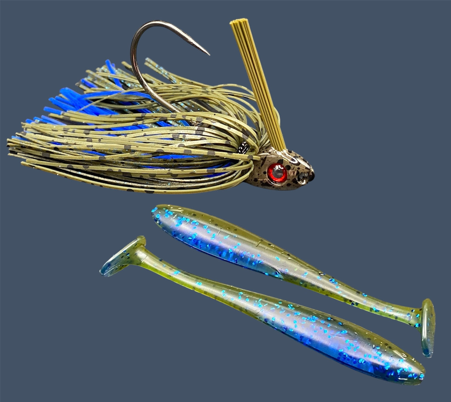 Fishing lure bundle with a high-quality jig and soft plastic bait, perfect for freshwater and saltwater fishing with a variety of soft plastic lures. Shown here in color Big "O" (Green Pumpkin and Blue Flake) is a hand tied Green Pumpkin swim jig paired with Big League Bait Pro Swim (Swim bait style soft plastic lure)