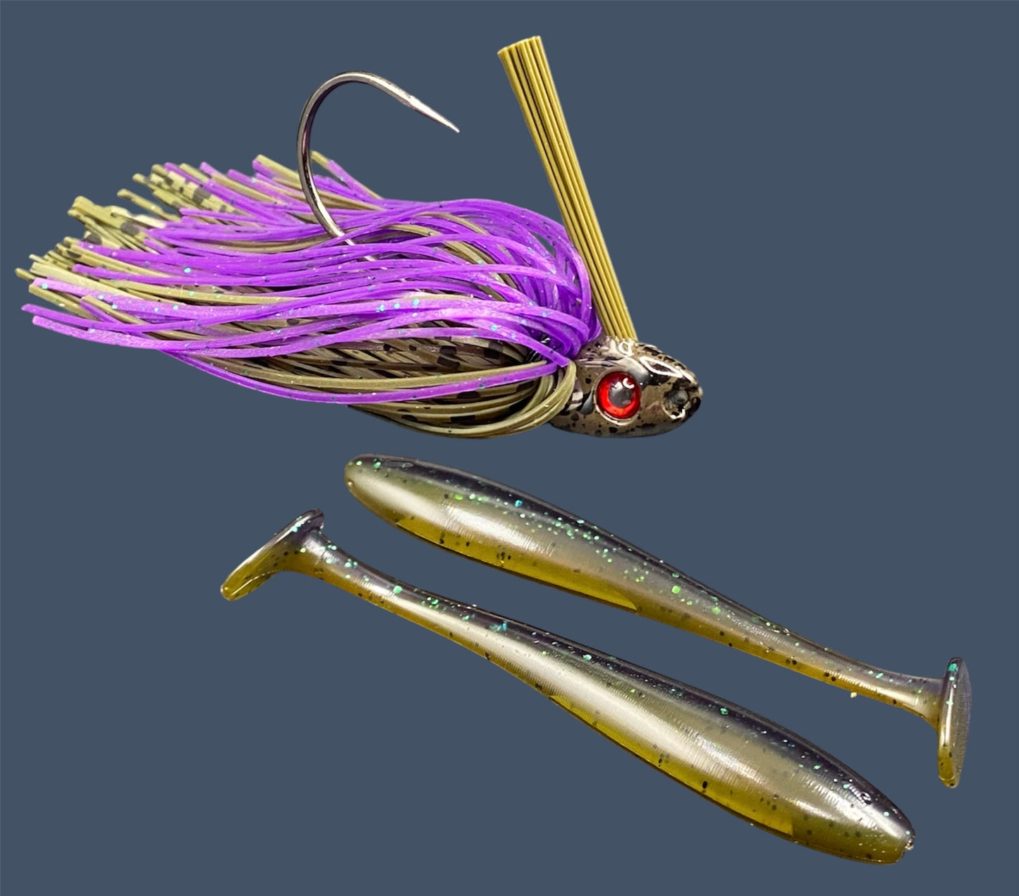 Fishing lure bundle with a high-quality jig and soft plastic bait, perfect for freshwater and saltwater fishing with a variety of soft plastic lures. Shown here in color Swamp Juice (Purple over Green Pumpkin) is a hand tied Green Pumpkin swim jig paired with Big League Bait Pro Swim (Swim bait style soft plastic lure)