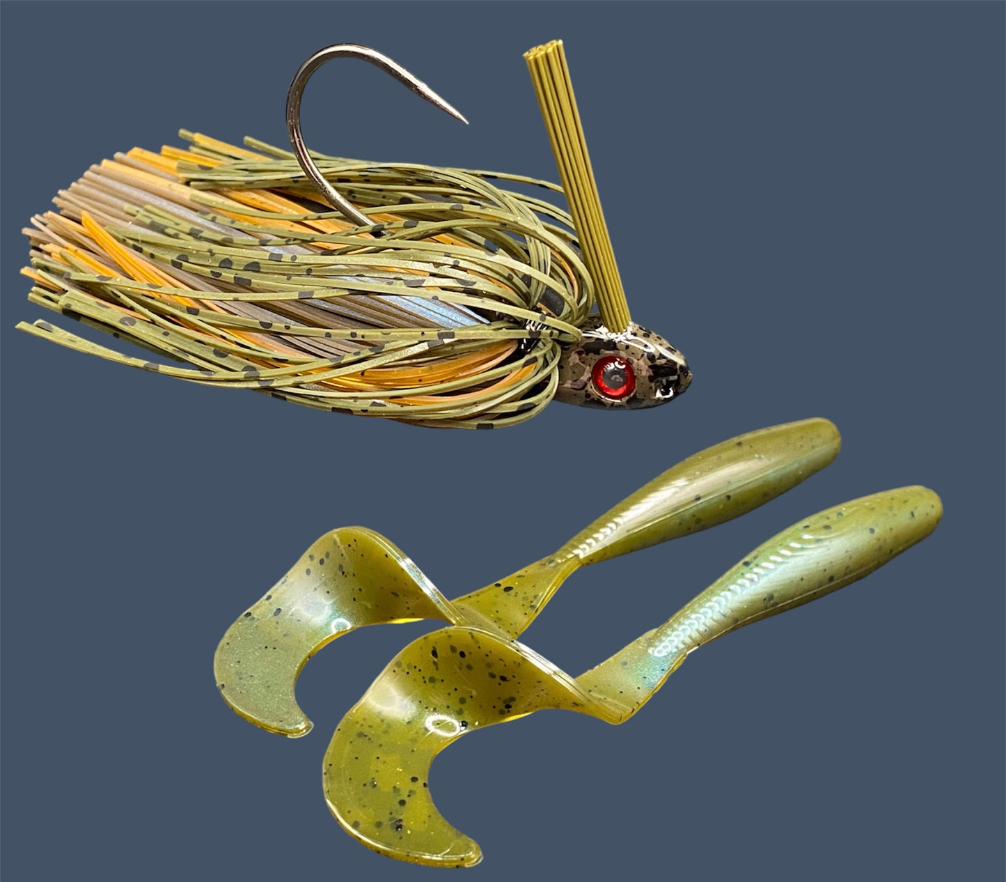 Fishing lure bundle with a high-quality jig and soft plastic bait, perfect for freshwater and saltwater fishing with a variety of soft plastic lures. Shown here in color Magic Craw (Green Pumpkin and Blue) is a hand tied Green Pumpkin swim jig paired with Big League Bait Single Tail Grub