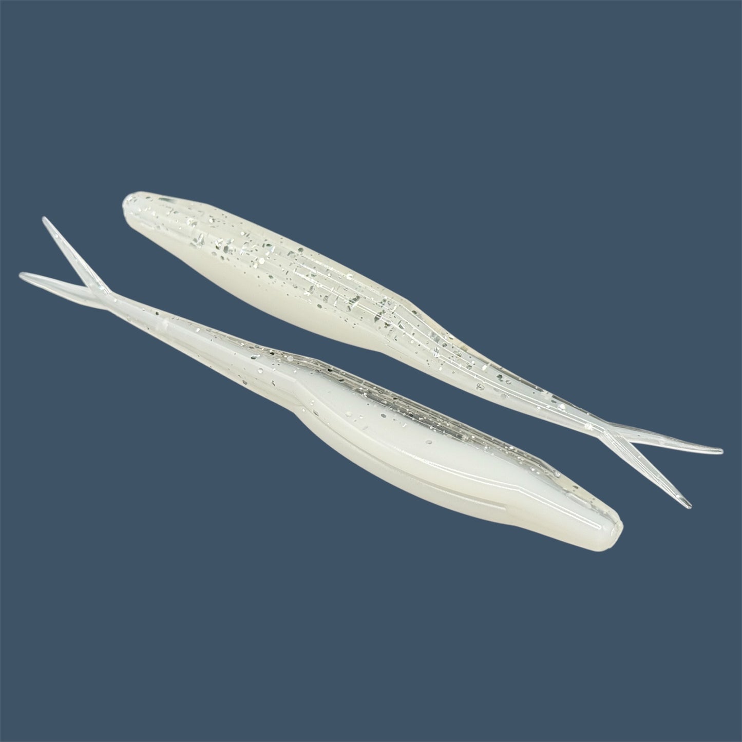 Split Tail Shad soft plastic Fluke style bait with realistic shad appearance, featuring a slotted belly for weedless rigging. Jerkbait in White Ice a proven fish-catching color