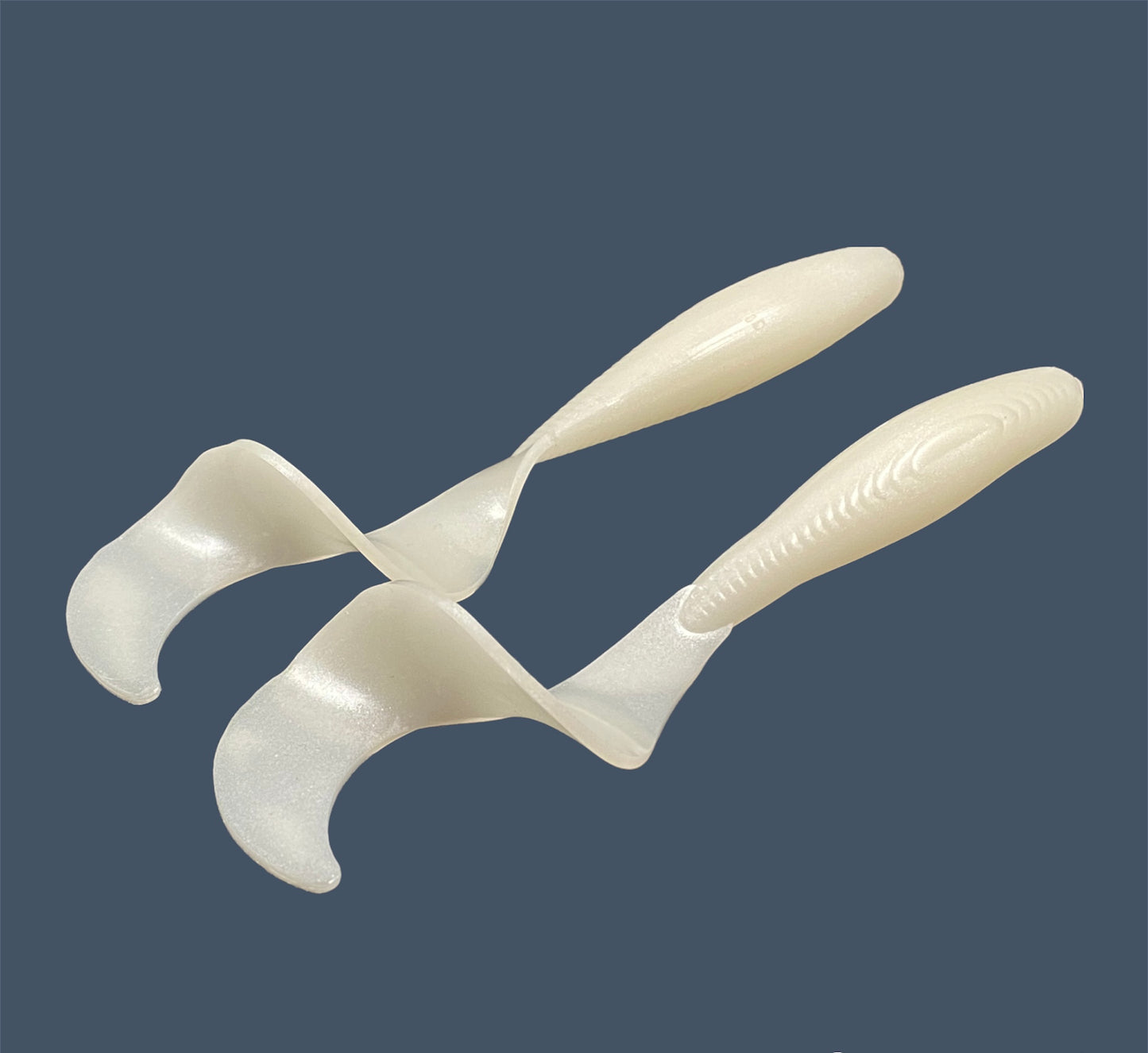 Single Tail Grub with a thick curl tail for strong water displacement, shown in White Pearl (White) a proven fish-catching color suitable for both freshwater fishing and inshore saltwater fishing