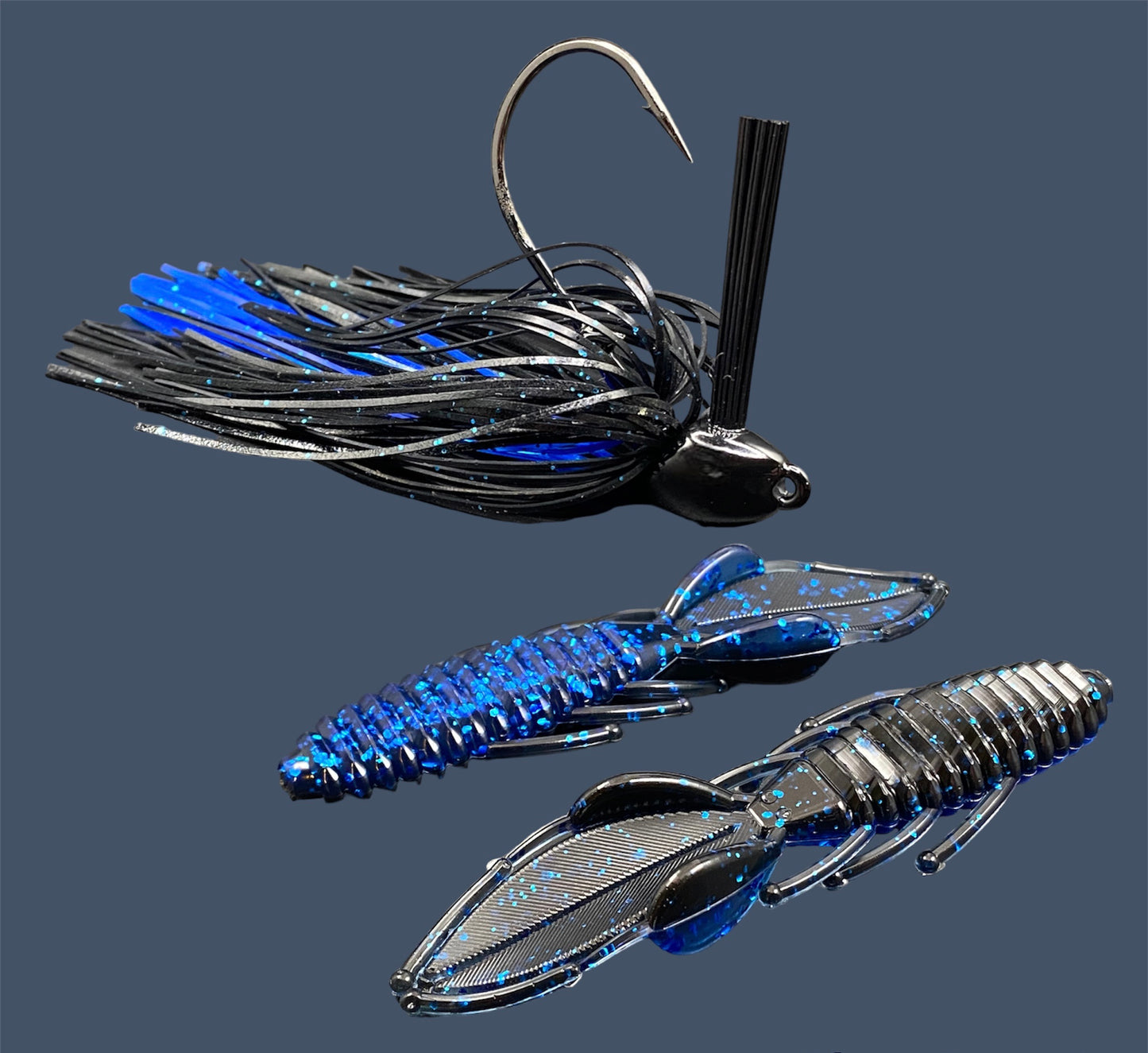 Fishing lure bundle with a high-quality jig and soft plastic bait, perfect for bass fishing with a variety of soft plastic lures. Shown here in color Black Sapphire (Black over blue flake) is a hand tied black flipping jig paired with Big League Bait Bed Wrecker (Creature style bait with pull apart appendages)