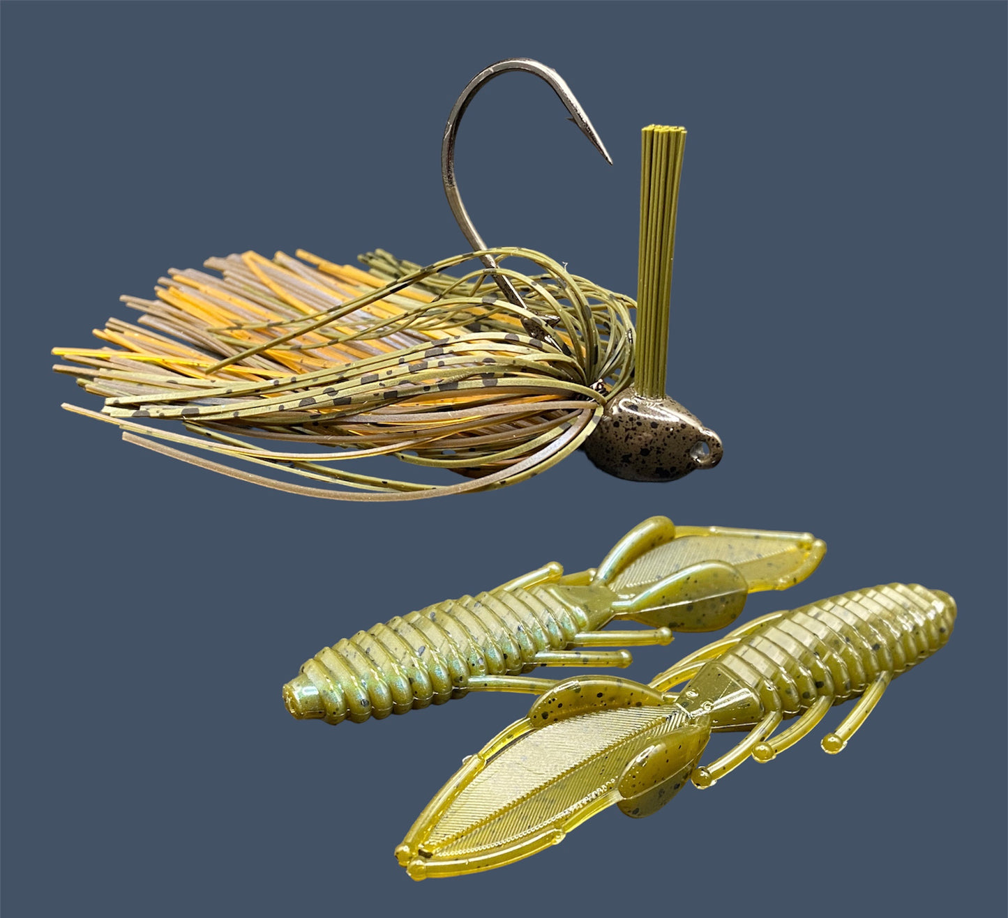 Fishing lure bundle with a high-quality jig and soft plastic bait, perfect for bass fishing with a variety of soft plastic lures. Shown here in color Magic Craw (Green Pumpkin and Blue) is a hand tied green pumpkin flipping jig paired with Big League Bait Bed Wrecker (Creature style bait with pull apart appendages)