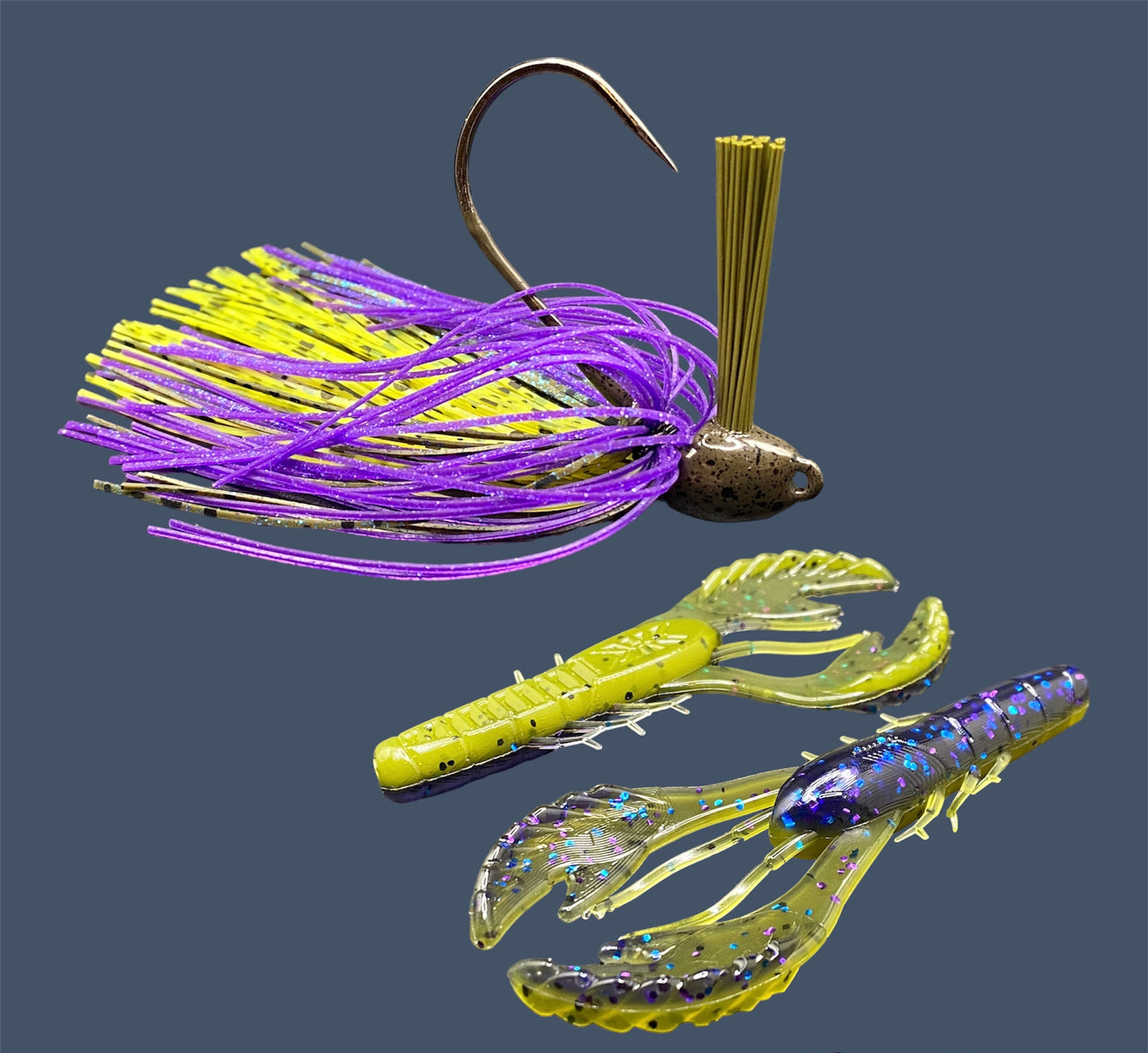 Fishing lure bundle with a high-quality jig and soft plastic bait, perfect for bass fishing with a variety of soft plastic lures. Shown here in color Luau (Purple over Banana Seed) is a hand tied green pumpkin flipping jig paired with Big League Bait Commotion Craw (Craw style soft plastic bait)