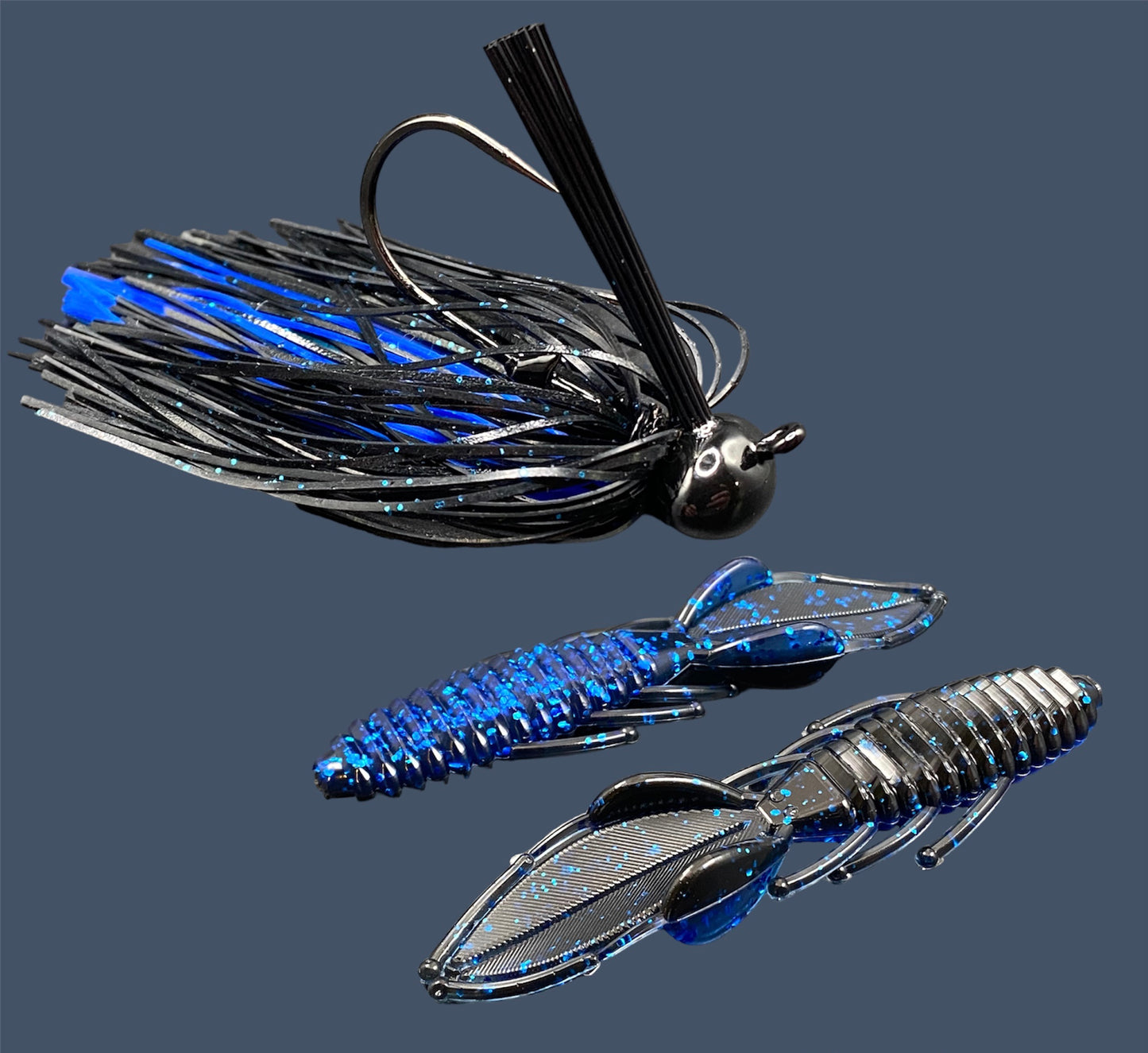 Fishing lure bundle with a high-quality jig and soft plastic bait, perfect for bass fishing with a variety of soft plastic lures. Shown here in color Black Sapphire (Black over blue flake) is a hand tied black football jig paired with Big League Bait Bed Wrecker (Creature style bait with pull apart appendages)