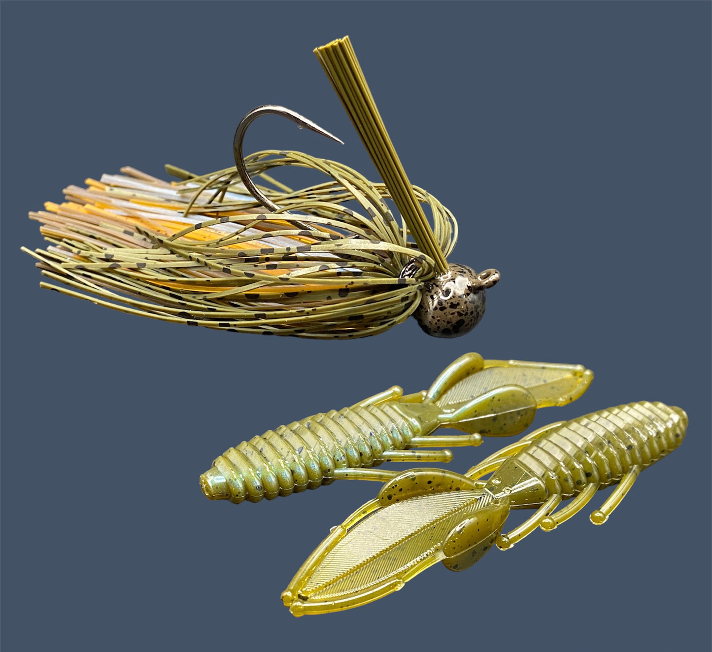 Fishing lure bundle with a high-quality jig and soft plastic bait, perfect for bass fishing with a variety of soft plastic lures. Shown here in color Magic Craw (Green Pumpkin and Blue) is a hand tied green pumpkin football jig paired with Big League Bait Bed Wrecker (Creature style bait with pull apart appendages)