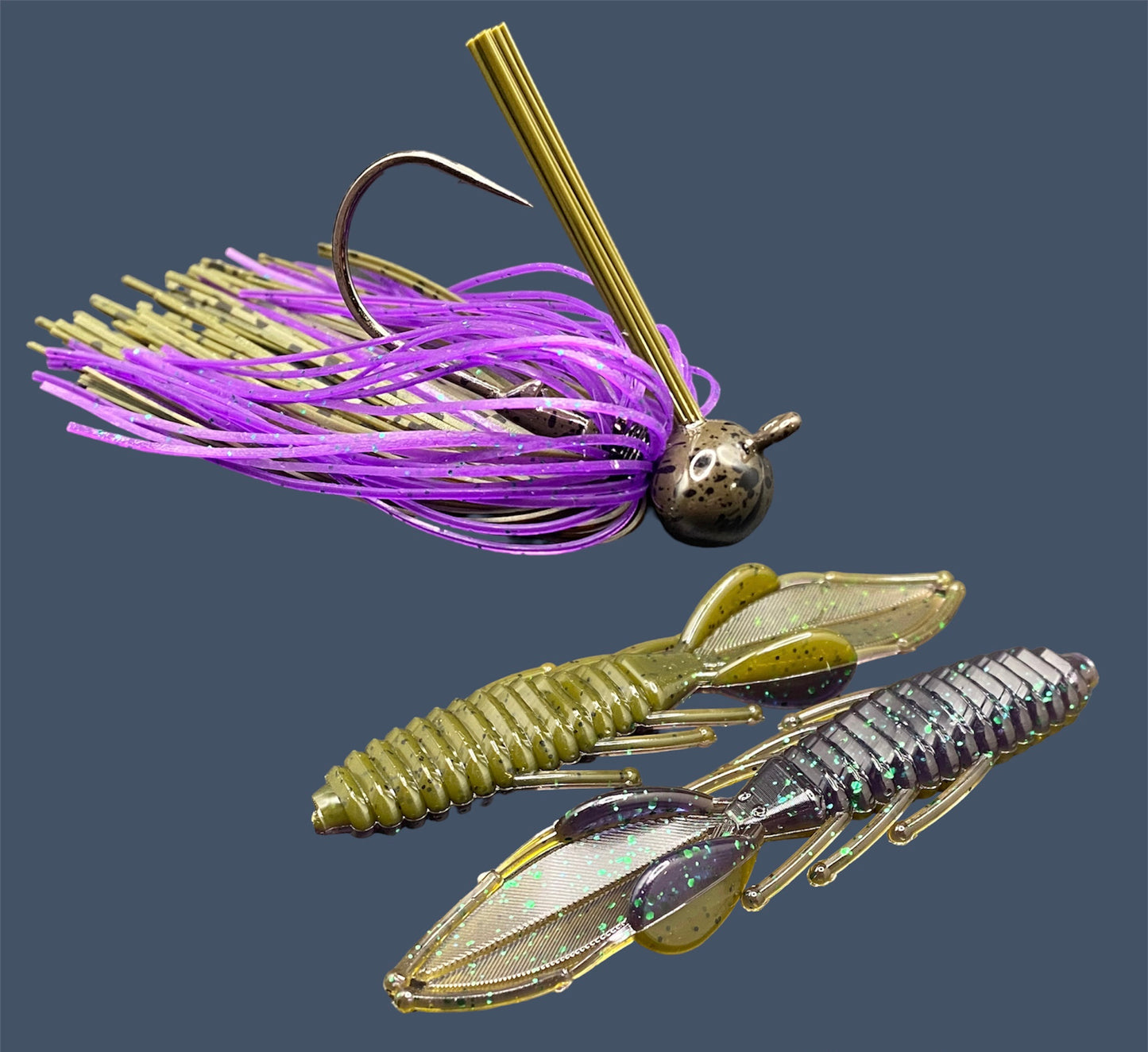 Fishing lure bundle with a high-quality jig and soft plastic bait, perfect for bass fishing with a variety of soft plastic lures. Shown here in color Swamp Juice (Purple over Green Pumpkin) is a hand tied green pumpkin football jig paired with Big League Bait Bed Wrecker (Creature style bait with pull apart appendages)