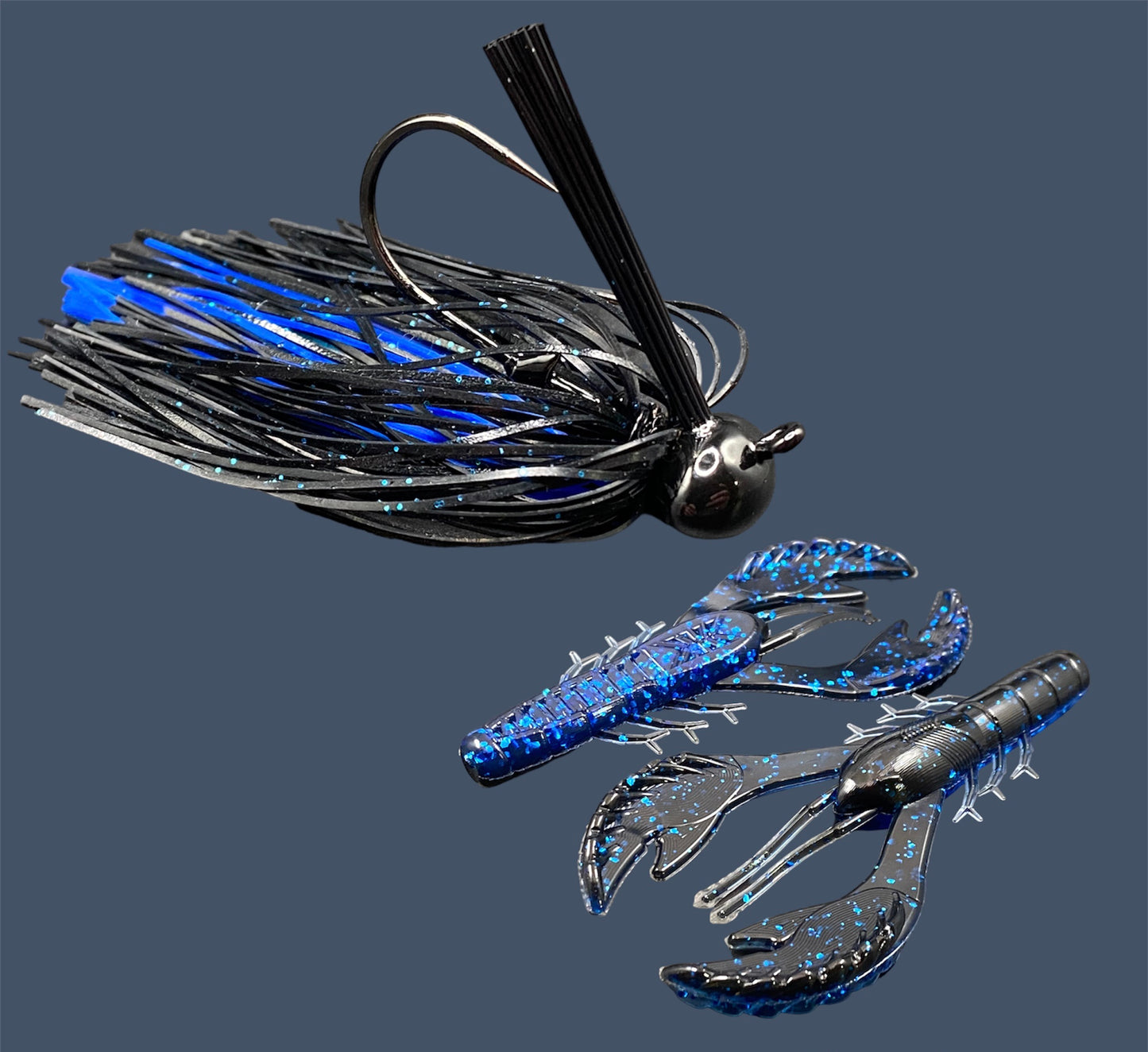 Fishing lure bundle with a high-quality jig and soft plastic bait, perfect for bass fishing with a variety of soft plastic lures. Shown here in color Black Sapphire (Black over blue flake) is a hand tied black football jig paired with Big League Bait Commotion Craw (Craw style soft plastic bait)