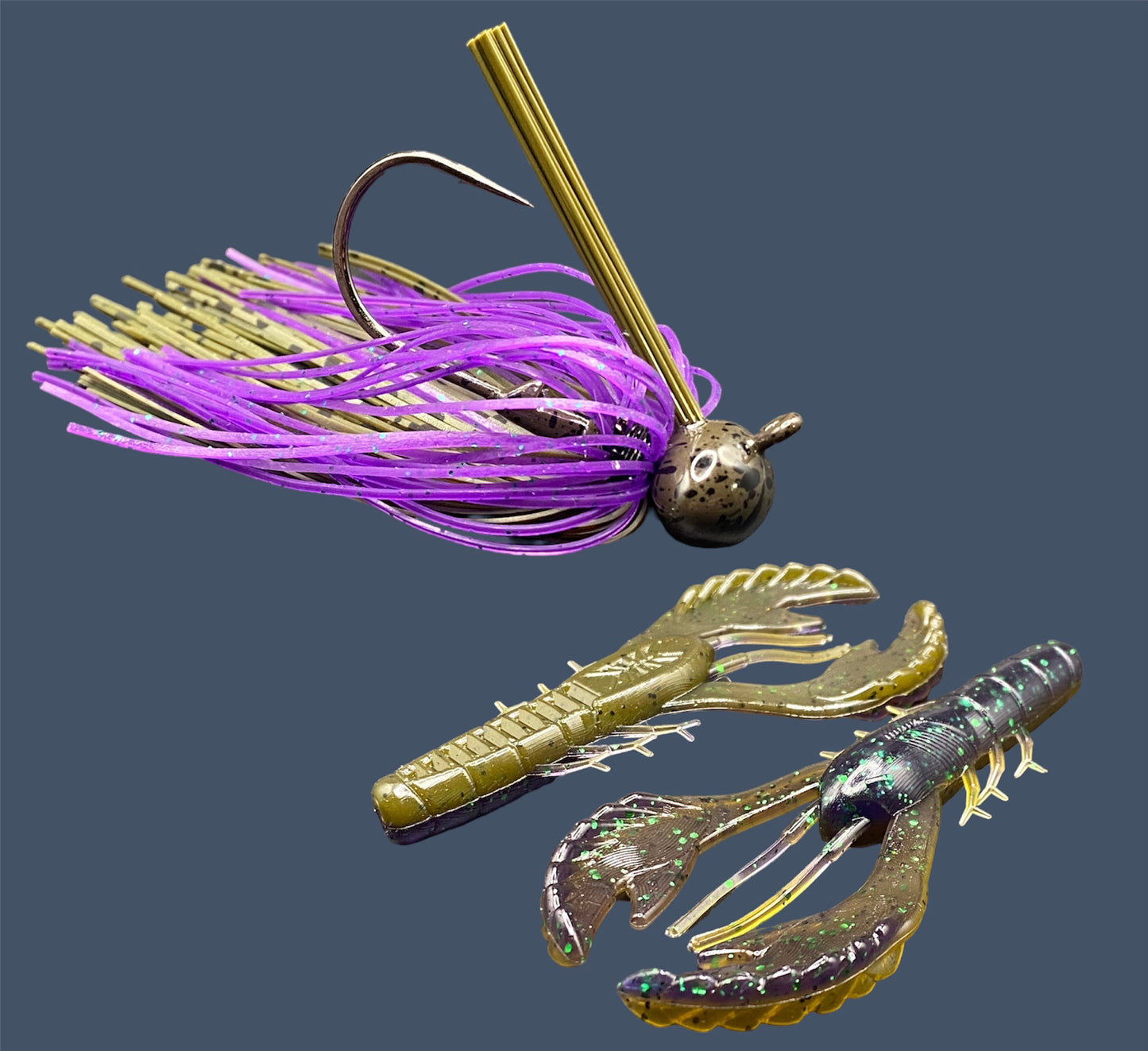 Fishing lure bundle with a high-quality jig and soft plastic bait, perfect for bass fishing with a variety of soft plastic lures. Shown here in color Swamp Juice (Purple over Green Pumpkin) is a hand tied green pumpkin football jig paired with Big League Bait Commotion Craw (Craw style soft plastic bait)