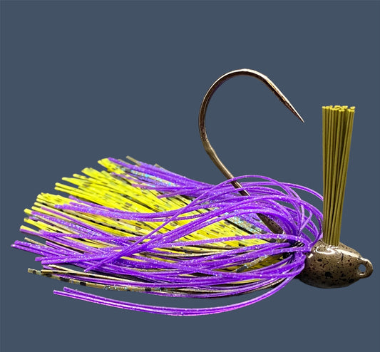 Flipping Jig in Luau, showcasing the aggressive angled heads, Mustad Hook and fiber weed guards for effective fishing in diverse conditions.