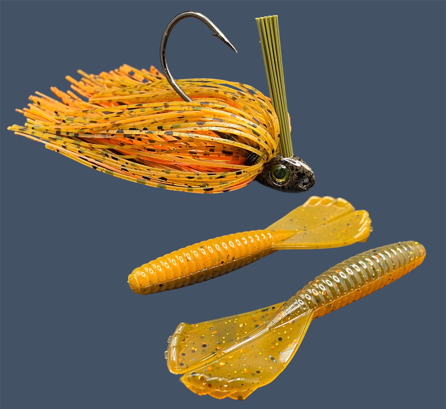 Fishing lure bundle with a high-quality jig and soft plastic bait, perfect for freshwater and saltwater fishing with a variety of soft plastic lures. Shown here in color Pumpkin Spice (Green Pumpkin over Orange) is a hand tied Green Pumpkin swim jig paired with Big League Bait Grub 3.5"