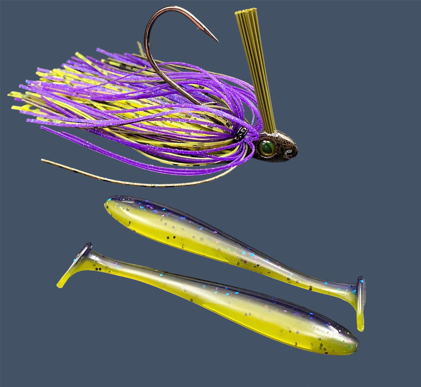 Fishing lure bundle with a high-quality jig and soft plastic bait, perfect for freshwater and saltwater fishing with a variety of soft plastic lures. Shown here in color Luau (Purple over Banana Seed) is a hand tied Green Pumpkin swim jig paired with Big League Bait Pro Swim (Swim bait style soft plastic lure)