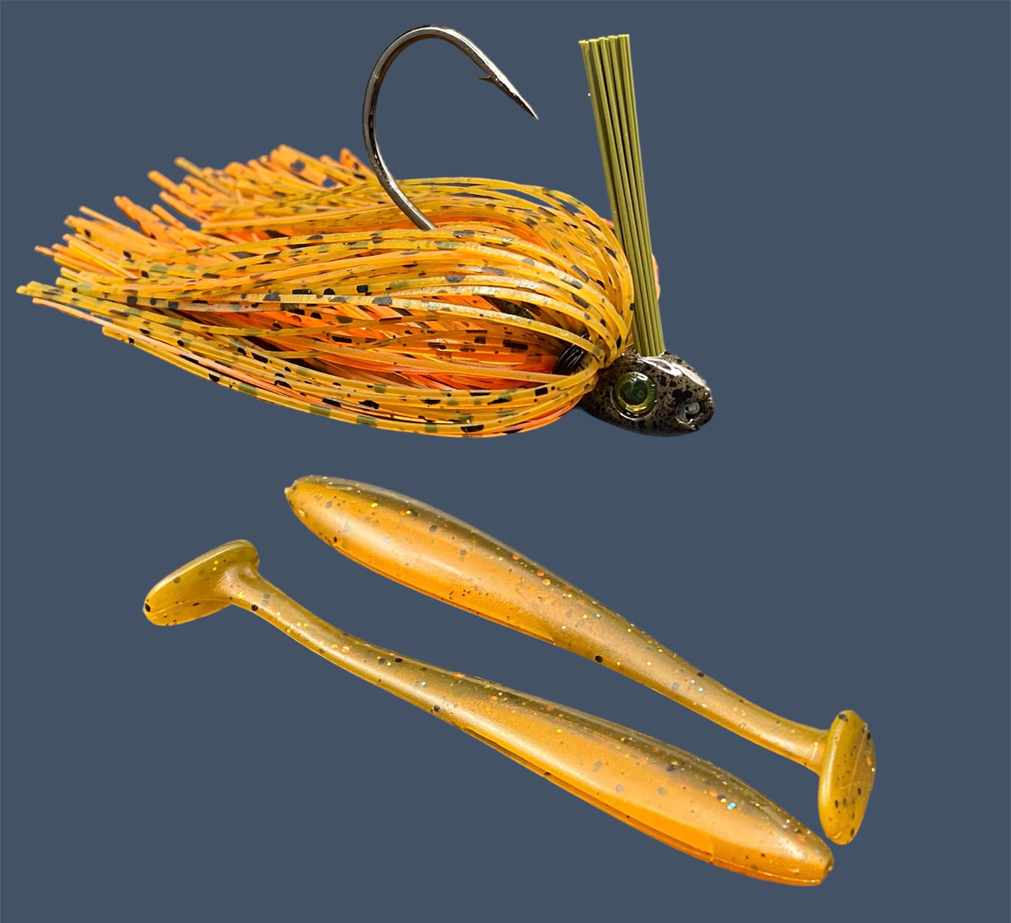Fishing lure bundle with a high-quality jig and soft plastic bait, perfect for freshwater and saltwater fishing with a variety of soft plastic lures. Shown here in color Pumpkin Spice (Green Pumpkin over Orange) is a hand tied Green Pumpkin swim jig paired with Big League Bait Pro Swim (Swim bait style soft plastic lure)