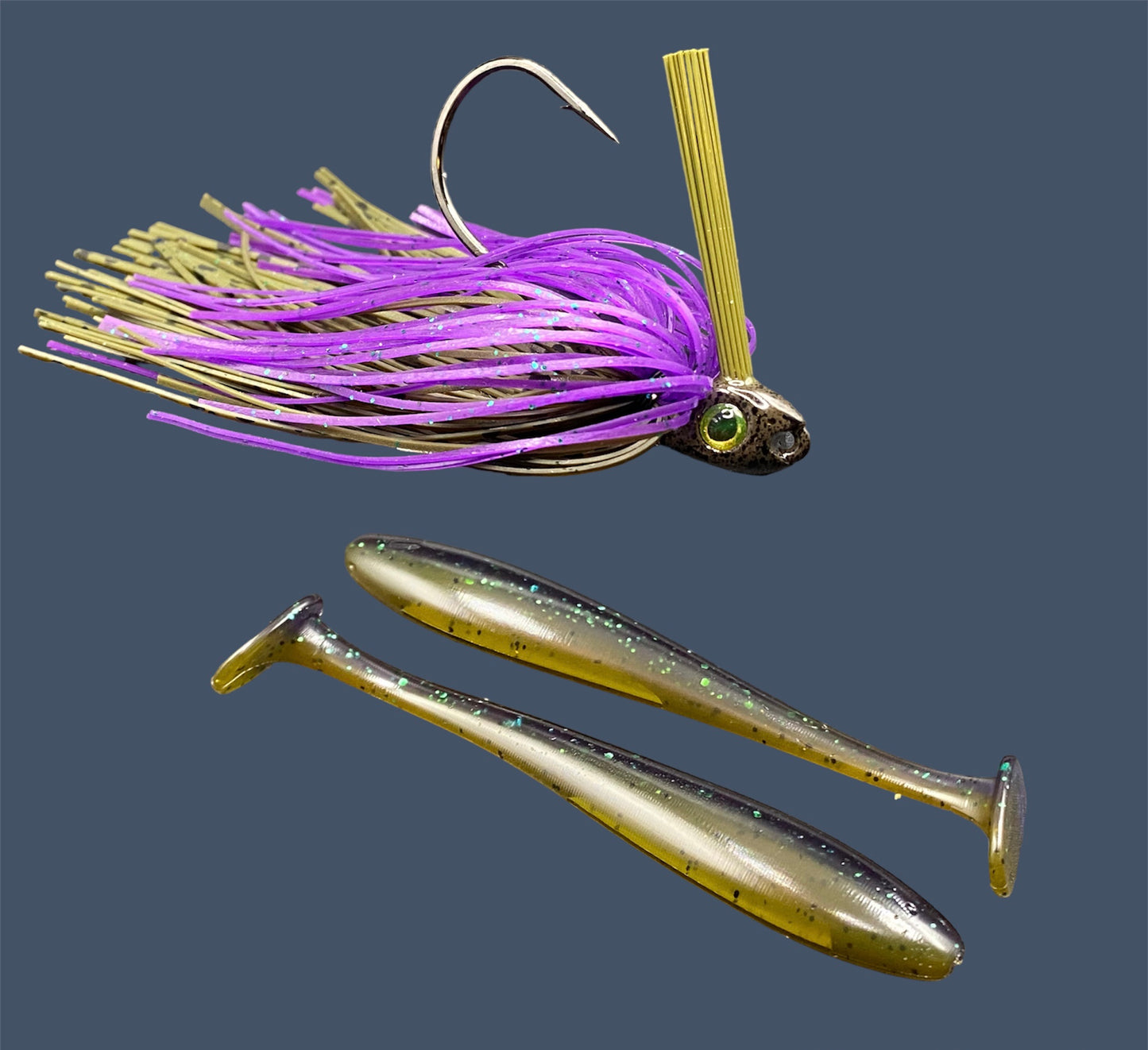 Fishing lure bundle with a high-quality jig and soft plastic bait, perfect for freshwater and saltwater fishing with a variety of soft plastic lures. Shown here in color Swamp Juice (Purple over Green Pumpkin) is a hand tied Green Pumpkin swim jig paired with Big League Bait Pro Swim (Swim bait style soft plastic lure)
