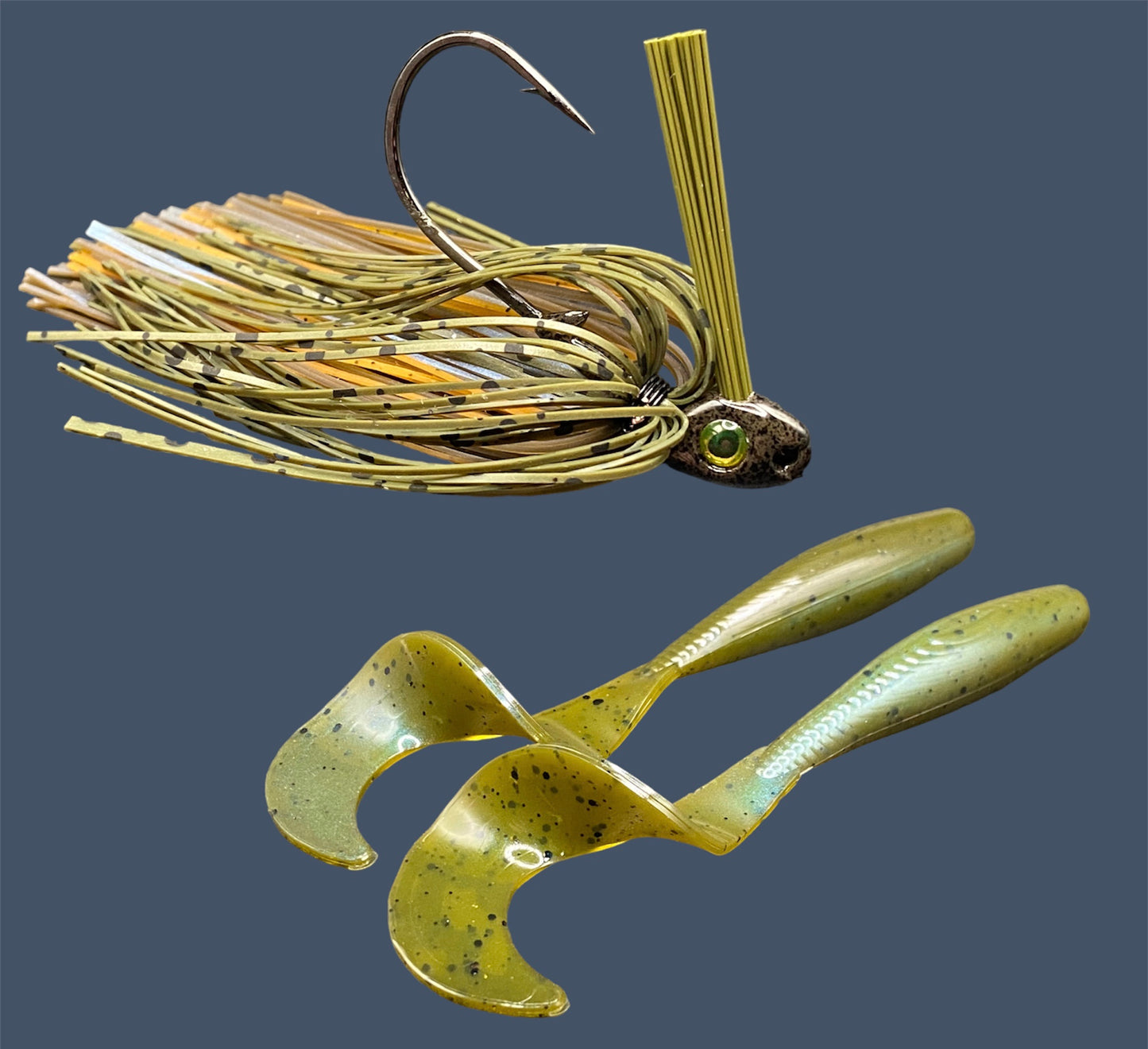 Fishing lure bundle with a high-quality jig and soft plastic bait, perfect for freshwater and saltwater fishing with a variety of soft plastic lures. Shown here in color Magic Craw (Green Pumpkin and Blue) is a hand tied Green Pumpkin swim jig paired with Big League Bait Single Tail Grub