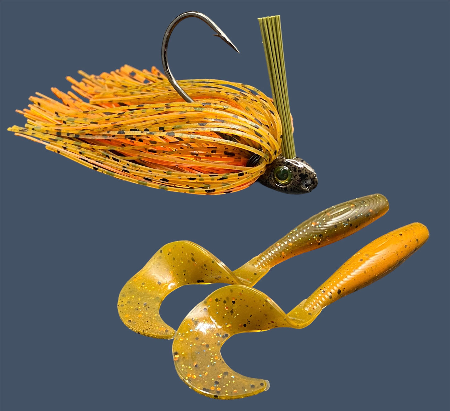 Fishing lure bundle with a high-quality jig and soft plastic bait, perfect for freshwater and saltwater fishing with a variety of soft plastic lures. Shown here in color Pumpkin Spice (Green Pumpkin over Orange) is a hand tied Green Pumpkin swim jig paired with Big League Bait Single Tail Grub