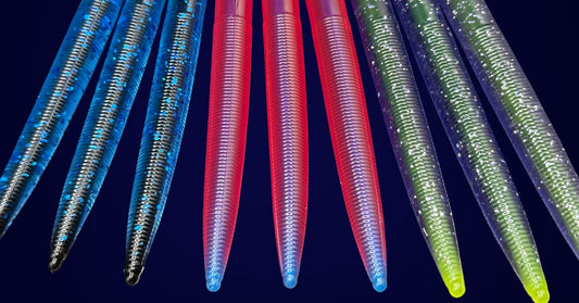 Three vibrant Corked Boomstick, core shot stick baits in bold colorways, soft plastic lures bass fishing from Big League Bait Company. 