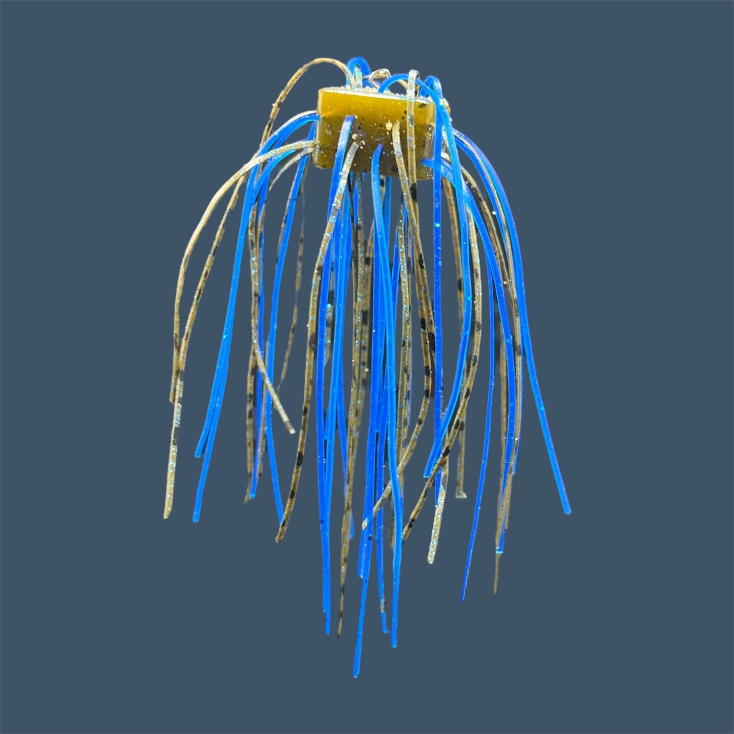 Skirted Cube Fuzzy Dice-style soft plastic bass lure, threaded with lifelike skirt material, perfect for drop shot and wacky rig finesse fishing.Shown in Big O