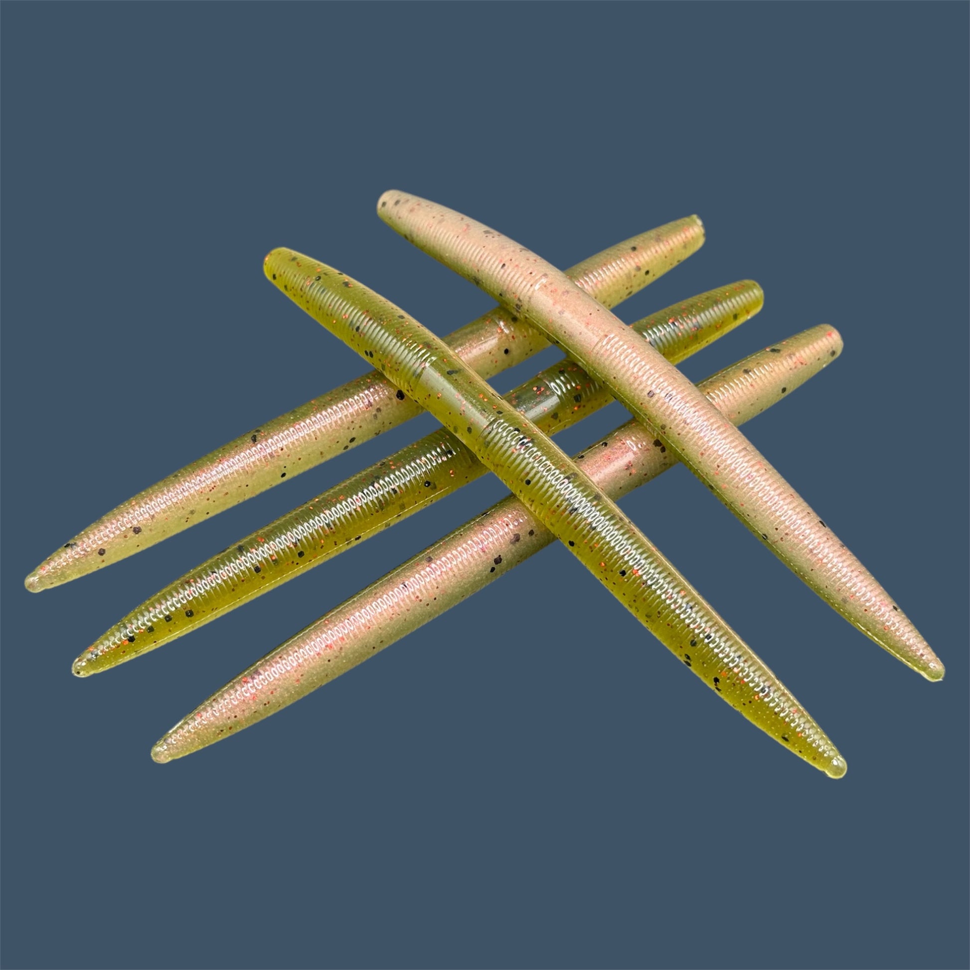 Boomstick is a senko-style stickbait for flipping, skipping, and casting, displayed in Watermelon Red Pearl for different fishing conditions in freshwater fishing. Great addition to any anglers tackle box