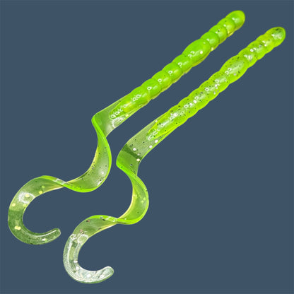 Soft plastic curly/ribbon tail worm 7.5-inch with realistic movement and versatile design for Texas and Carolina rigs. 7.5" Curl Tail Worm shown in Chartreuse Shad