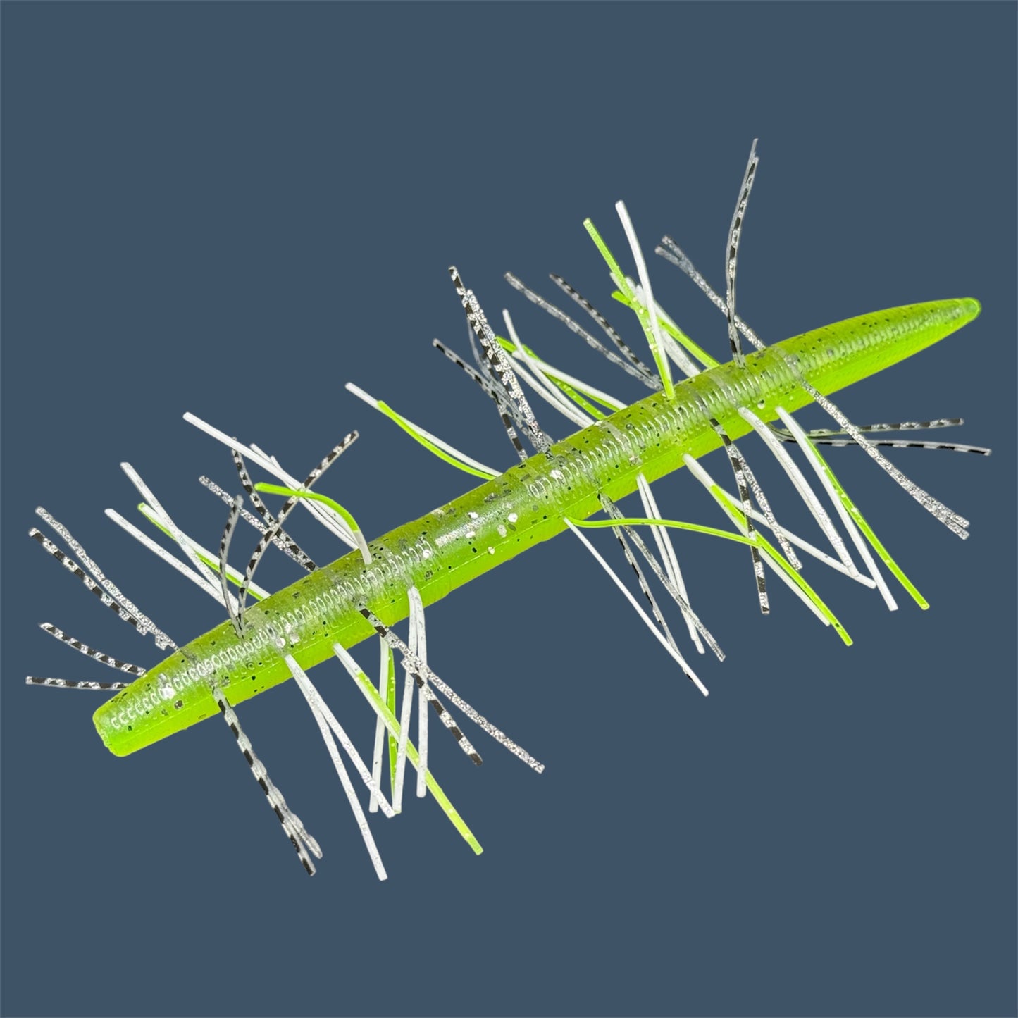 Skirted Boomstick Soft Plastic Bait (Stick worm style bait) with embedded skirt material for Fishing. Shown in Chartreuse Shad Fuzzy Soft Plastic Lure