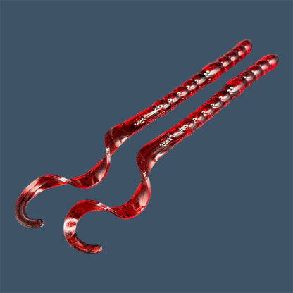 Soft plastic curly/ribbon tail worm 7.5-inch with realistic movement and versatile design for Texas and Carolina rigs. 7.5" Curl Tail Worm shown in Cherry Seed