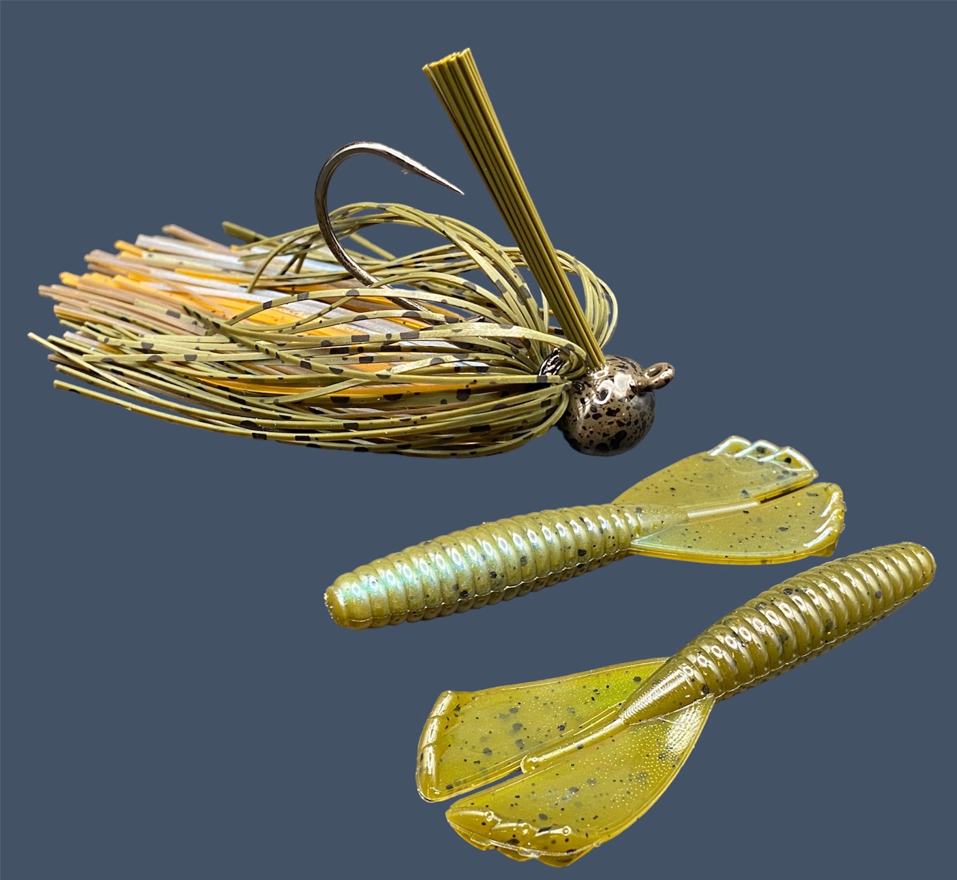 Fishing lure bundle with a high-quality jig and soft plastic bait, perfect for bass fishing with a variety of soft plastic lures. Shown here in color Magic Craw (Green Pumpkin and Blue) is a hand tied green pumpkin football jig paired with Big League Bait Grub 3.5"