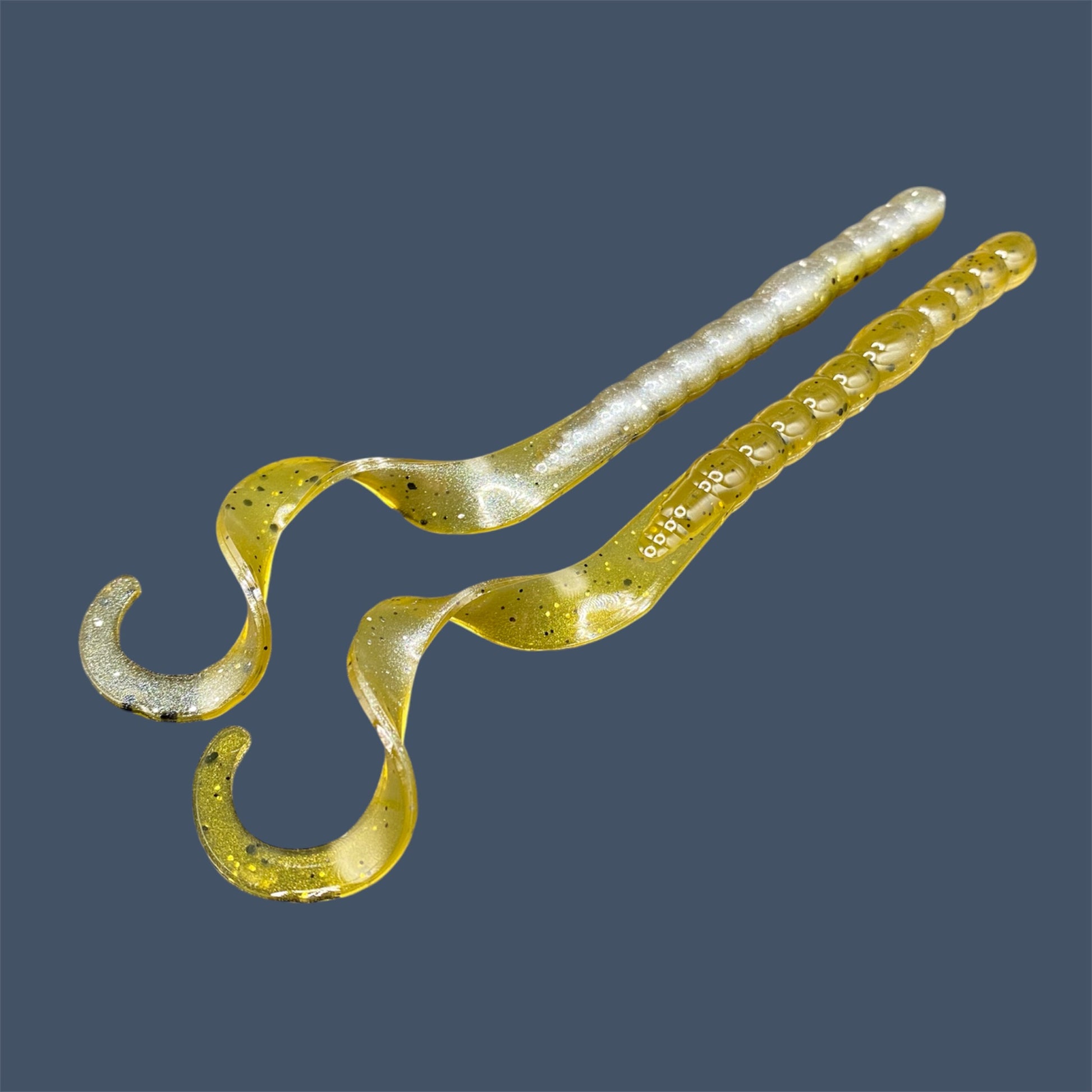 Soft plastic curly/ribbon tail worm 7.5-inch with realistic movement and versatile design for Texas and Carolina rigs. 7.5" Curl Tail Worm shown in GP Flash