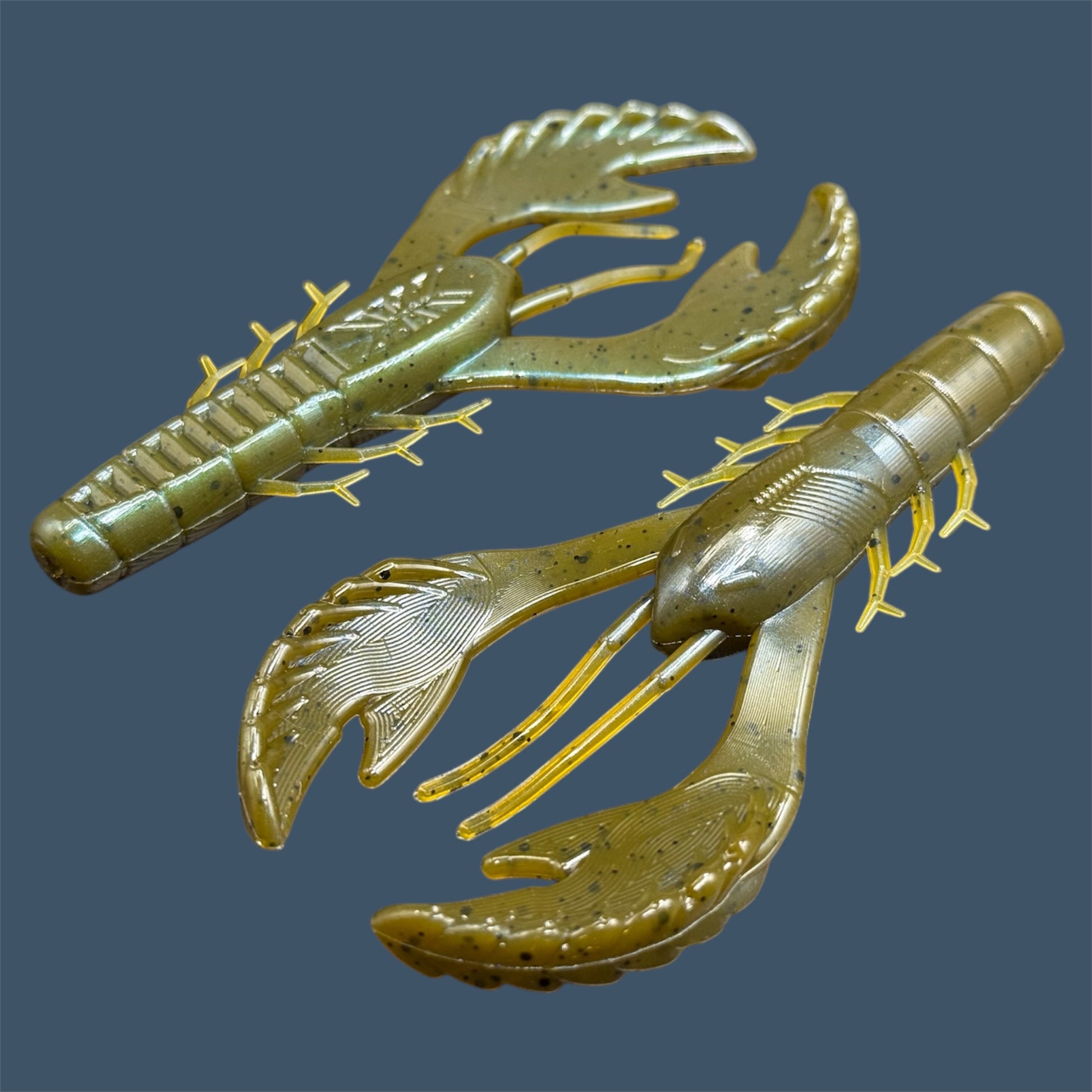 Commotion Craw craw style bait with hard-kicking claws and 4-inch frame, shown in Magic Craw (Green Pumpkin)