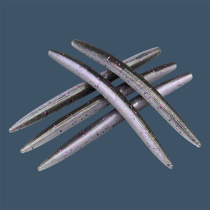 Boomstick is a senko-style stickbait for flipping, skipping, and casting, displayed in Mojo (Black and Purple) for different fishing conditions in freshwater fishing. Great addition to any anglers tackle box